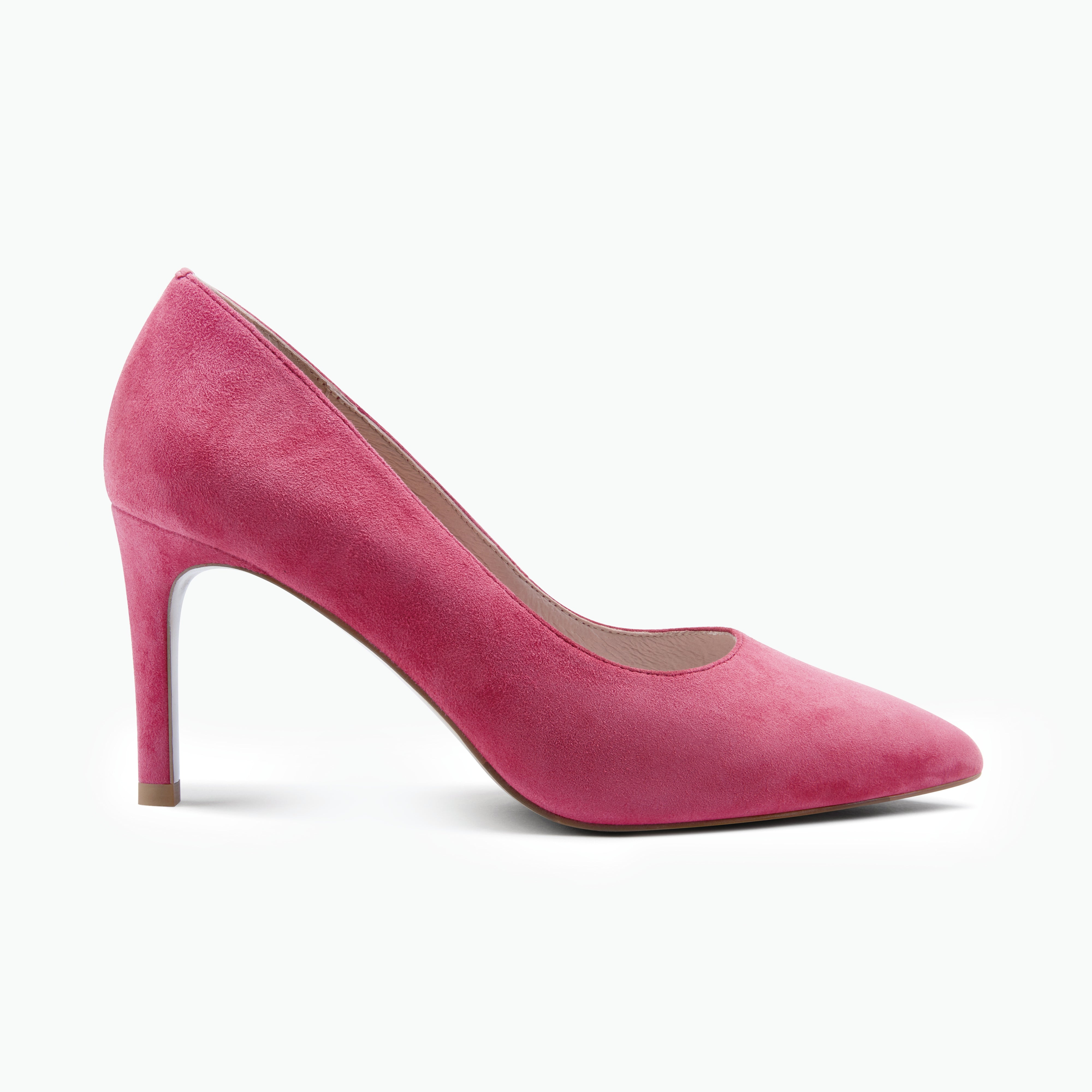 A single pink suede leather pump high heel with a pointed toe, shown in profile against a plain white background.