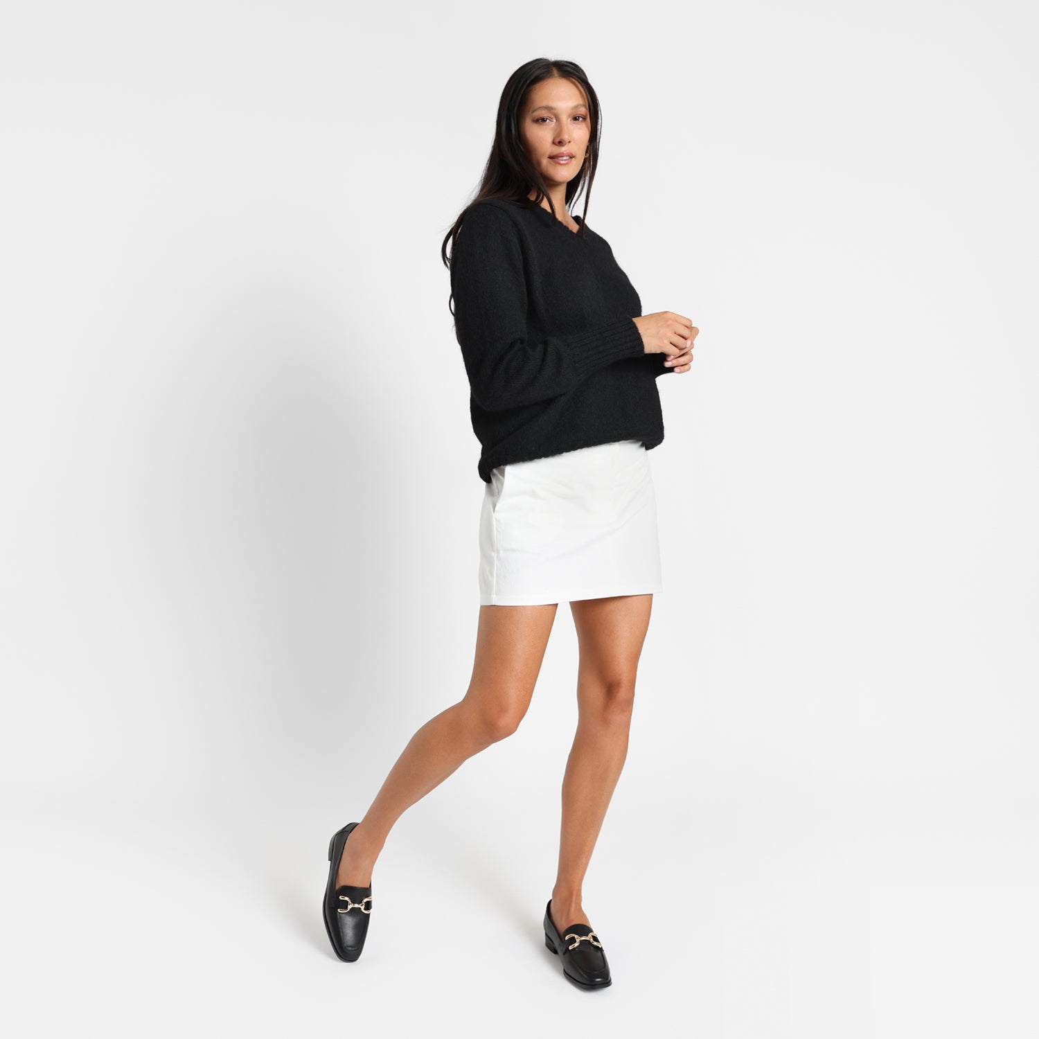 Alisa black leather loafer worn by model in motion