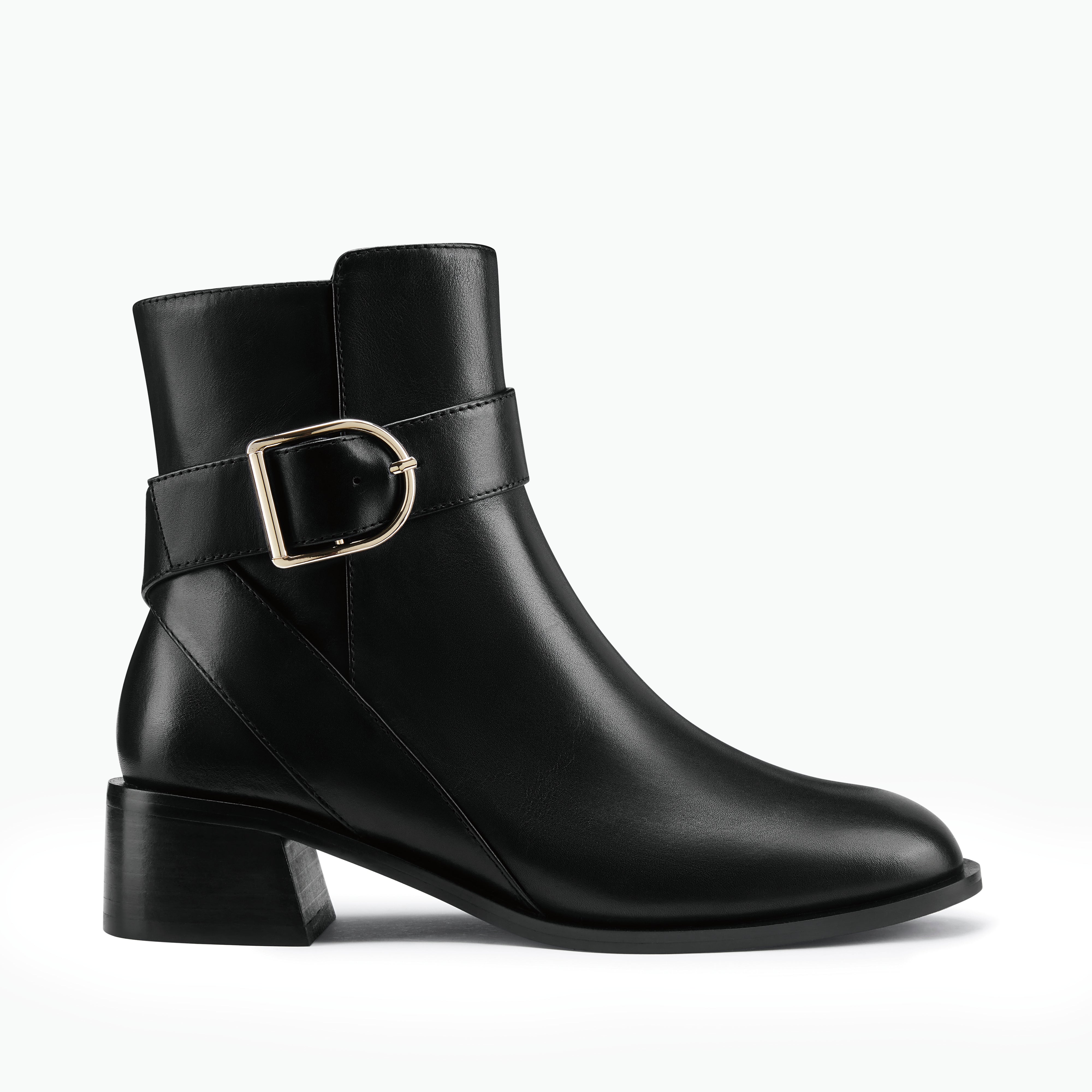 Bologna black leather ankle boot with strap detail and gold buckle shown from the side.