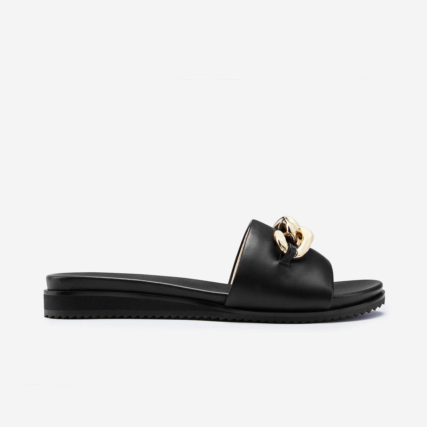 Bowie black slide sandal shown from side profile. They have a black leather upper and a moulded leather sole.