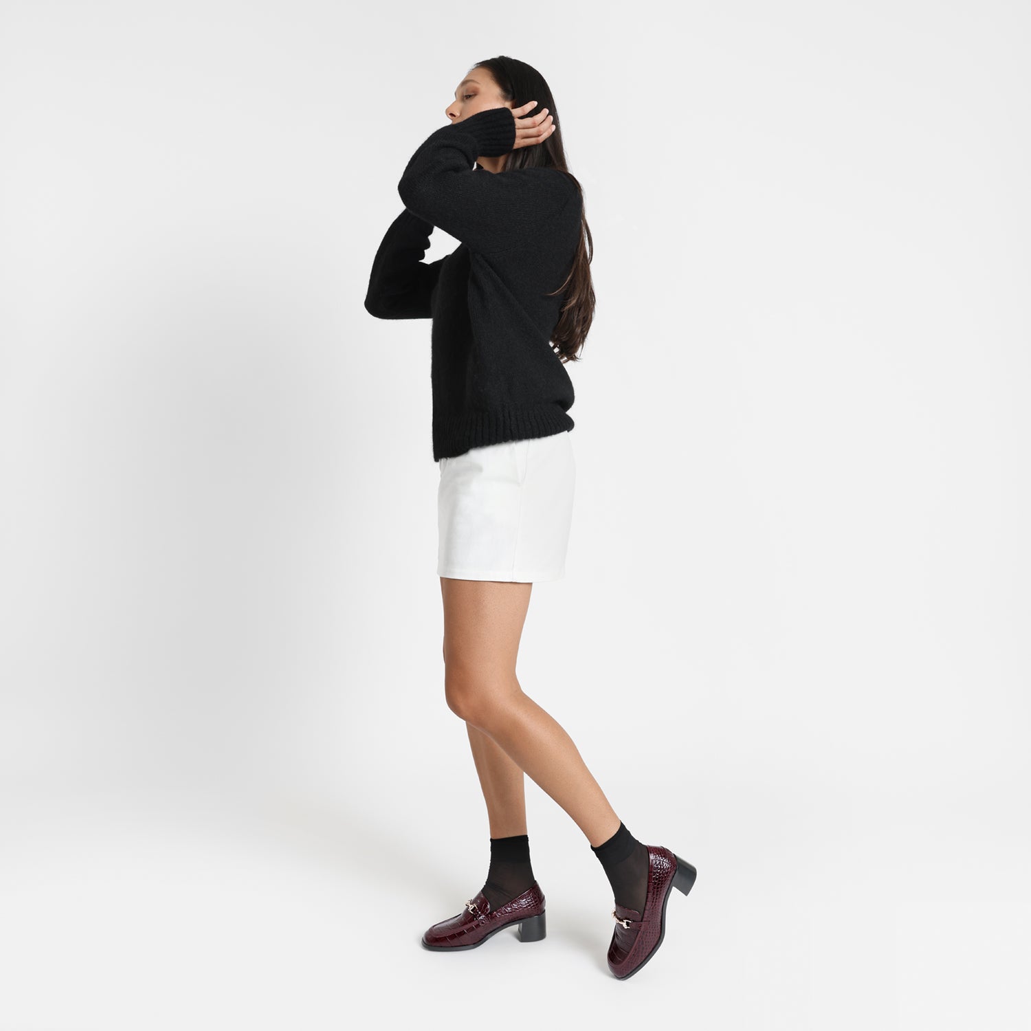 Bremen Ltd Ed loafer shoe in ox blood on model with 4.5cm heel and gold hardware.