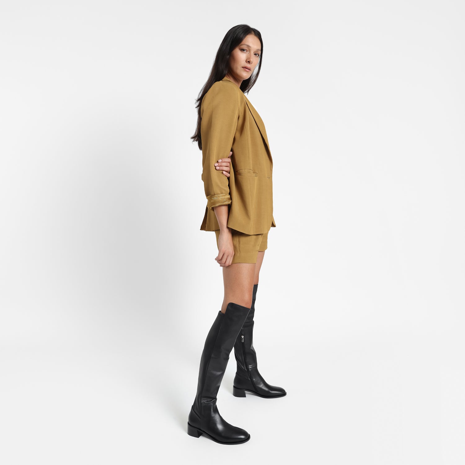 Brussels black leather long boots with4.5cm heel worn by model.