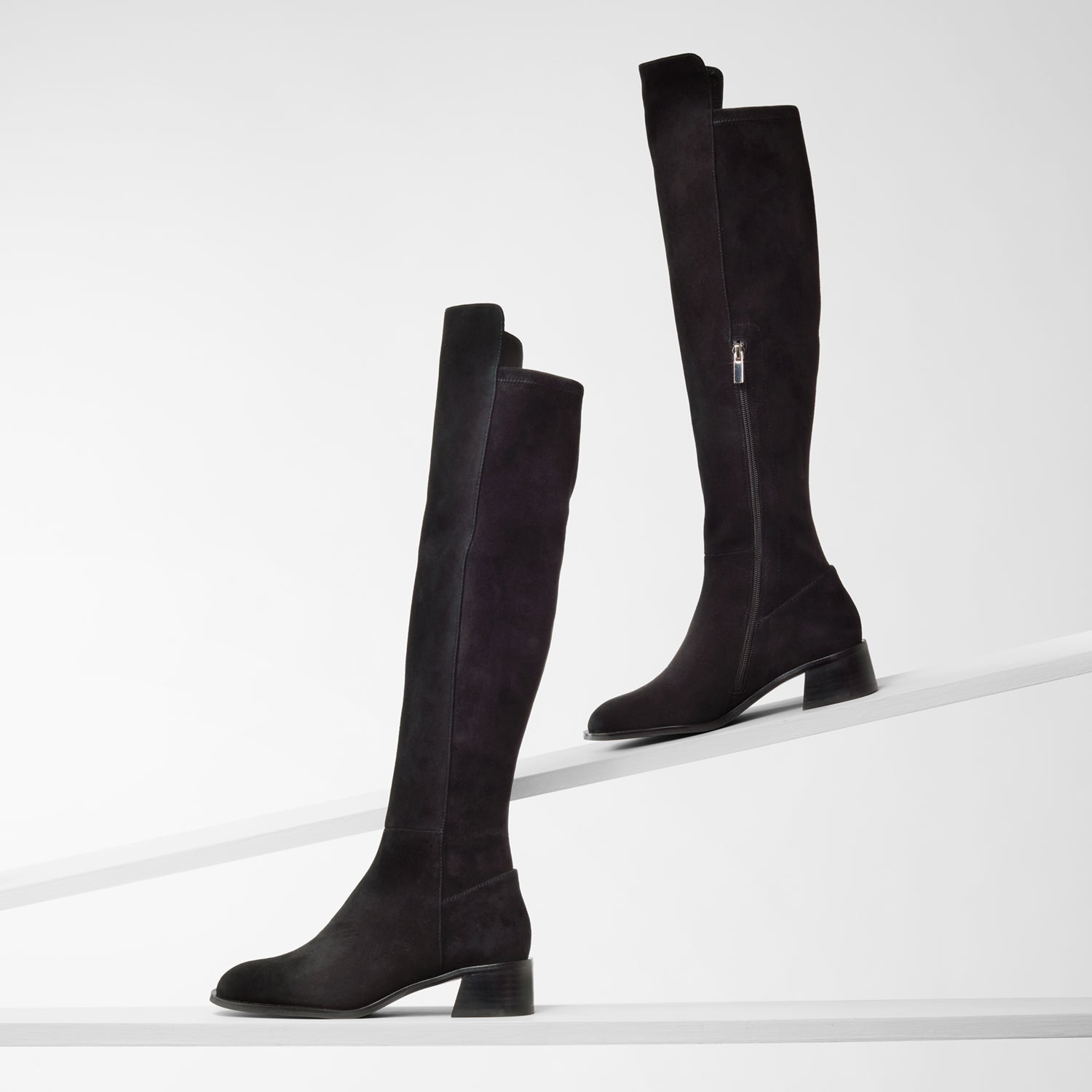Side view of Brussels black suede long boot with silver zips and 4.5cm heel.
