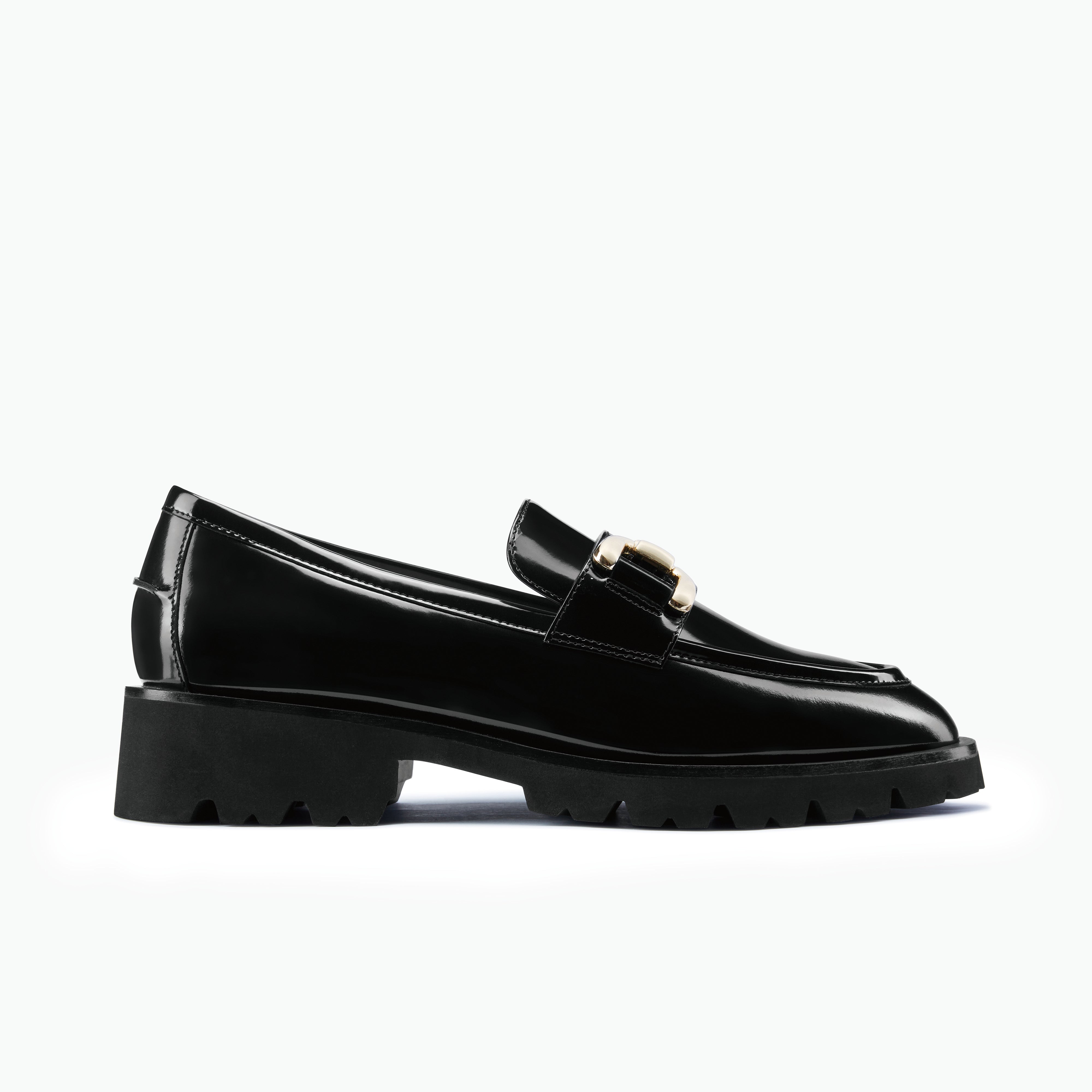 California Loafer in black oiled leather with gold buckle and chunky black outsole.