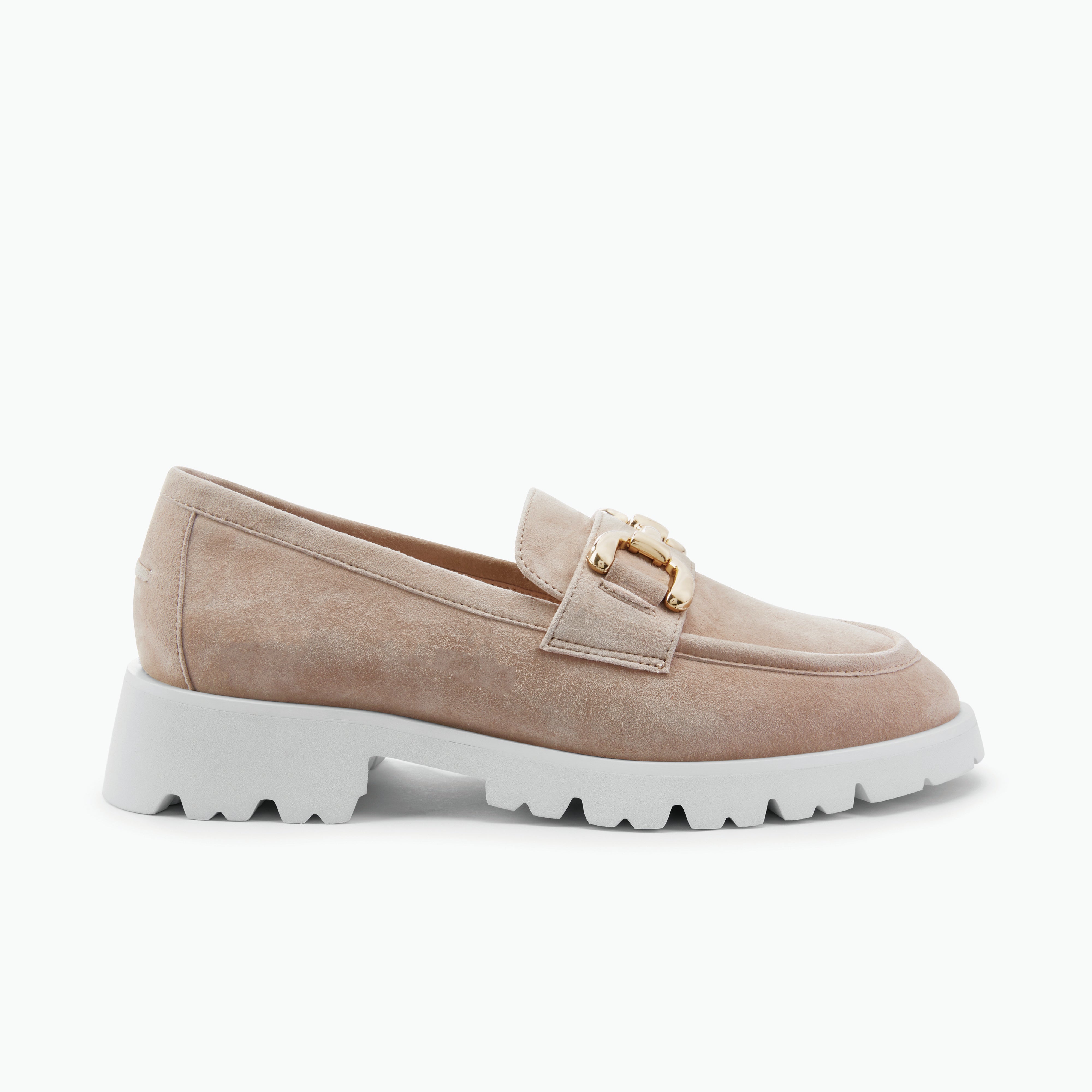 Suede loafer shoe with a gold buckle on a white background