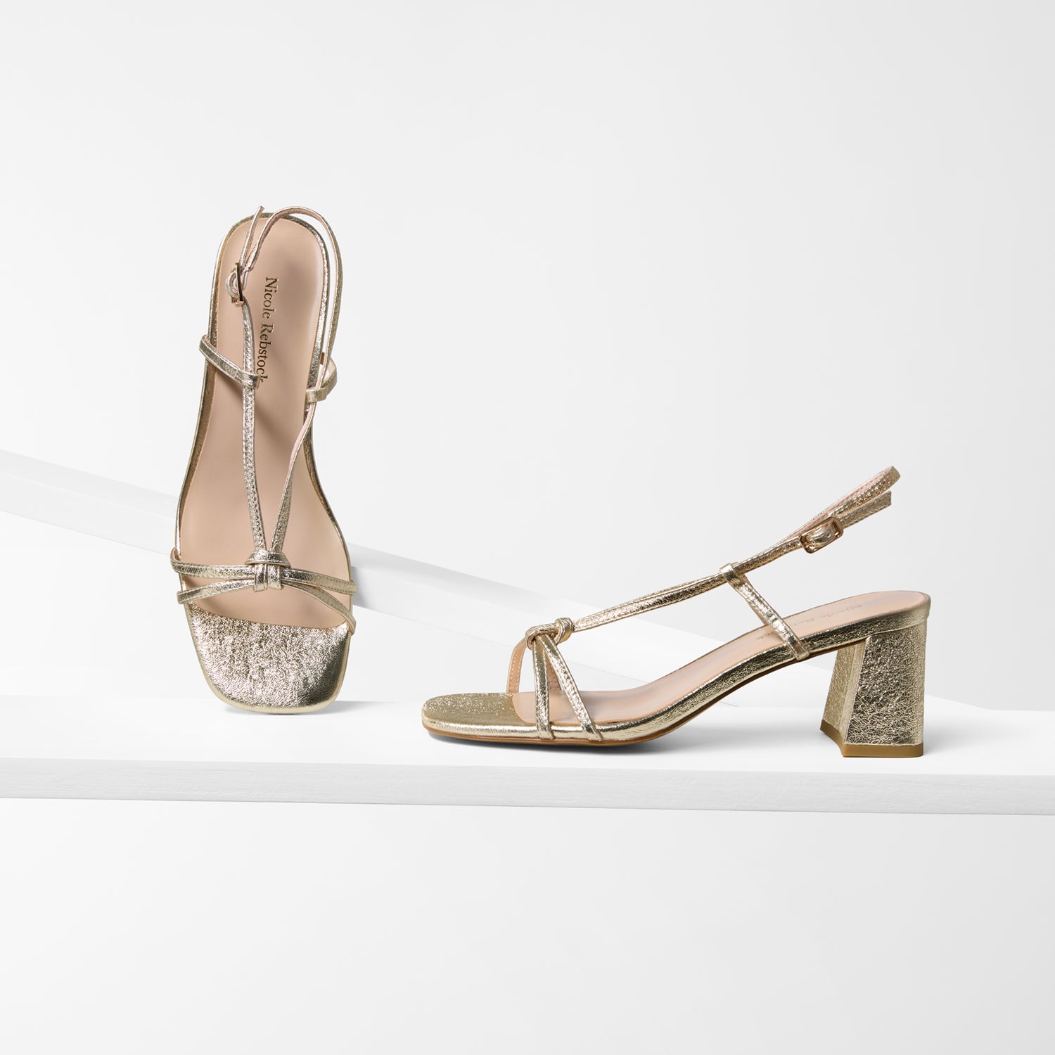 Gold sandal heel side and top profiles