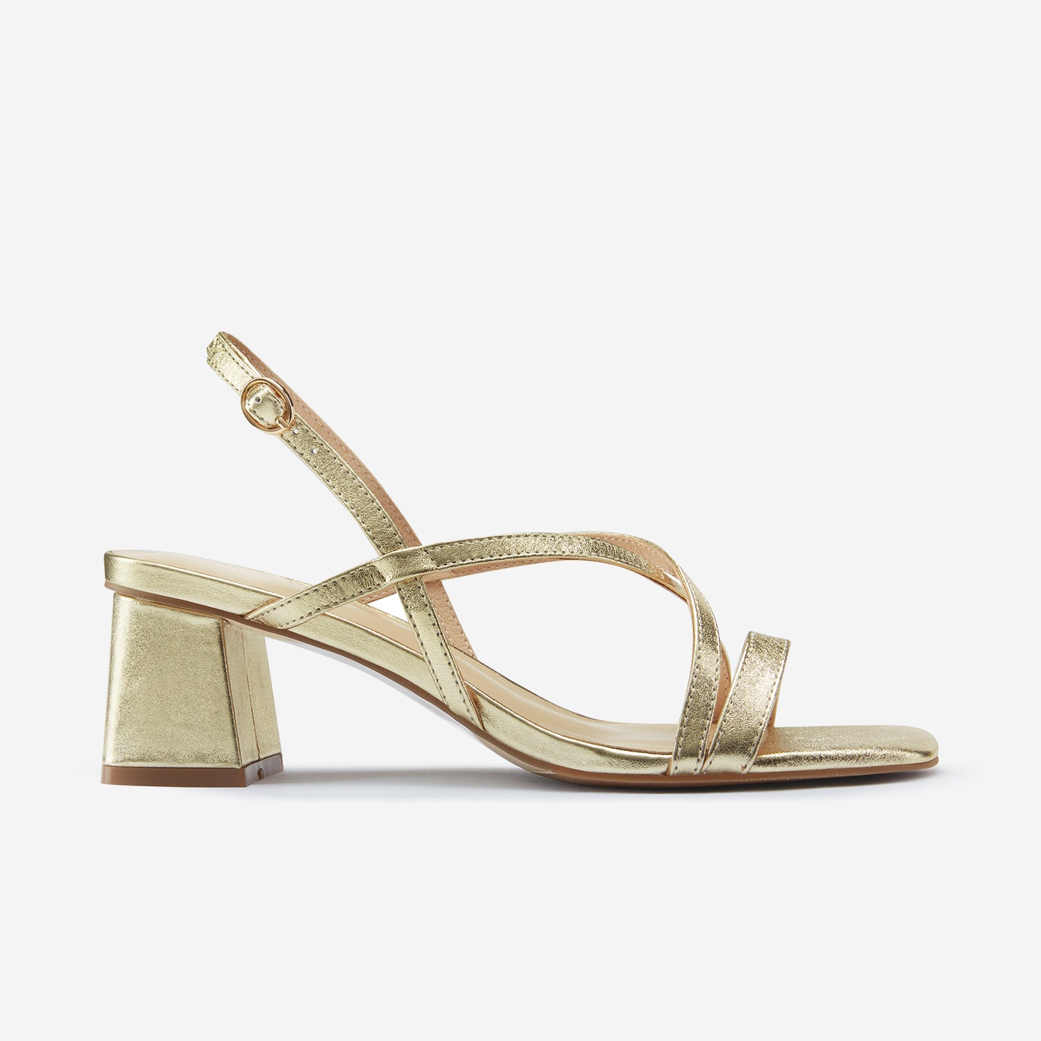 Strappy gold sandal called Ella shown from the side. 6cm low block heel.