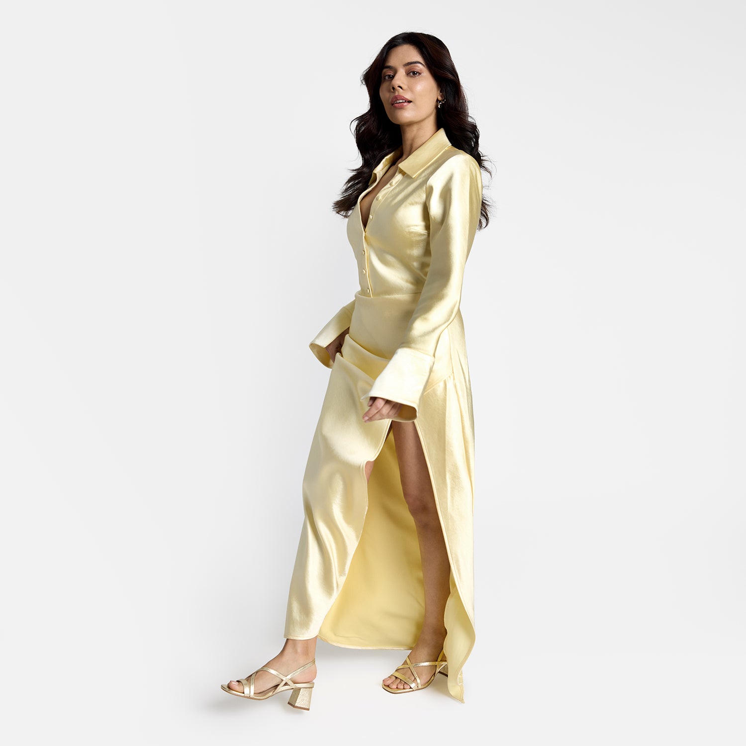 Model is wearing Ella sandal in gold. Block heel that is 6cm in height.