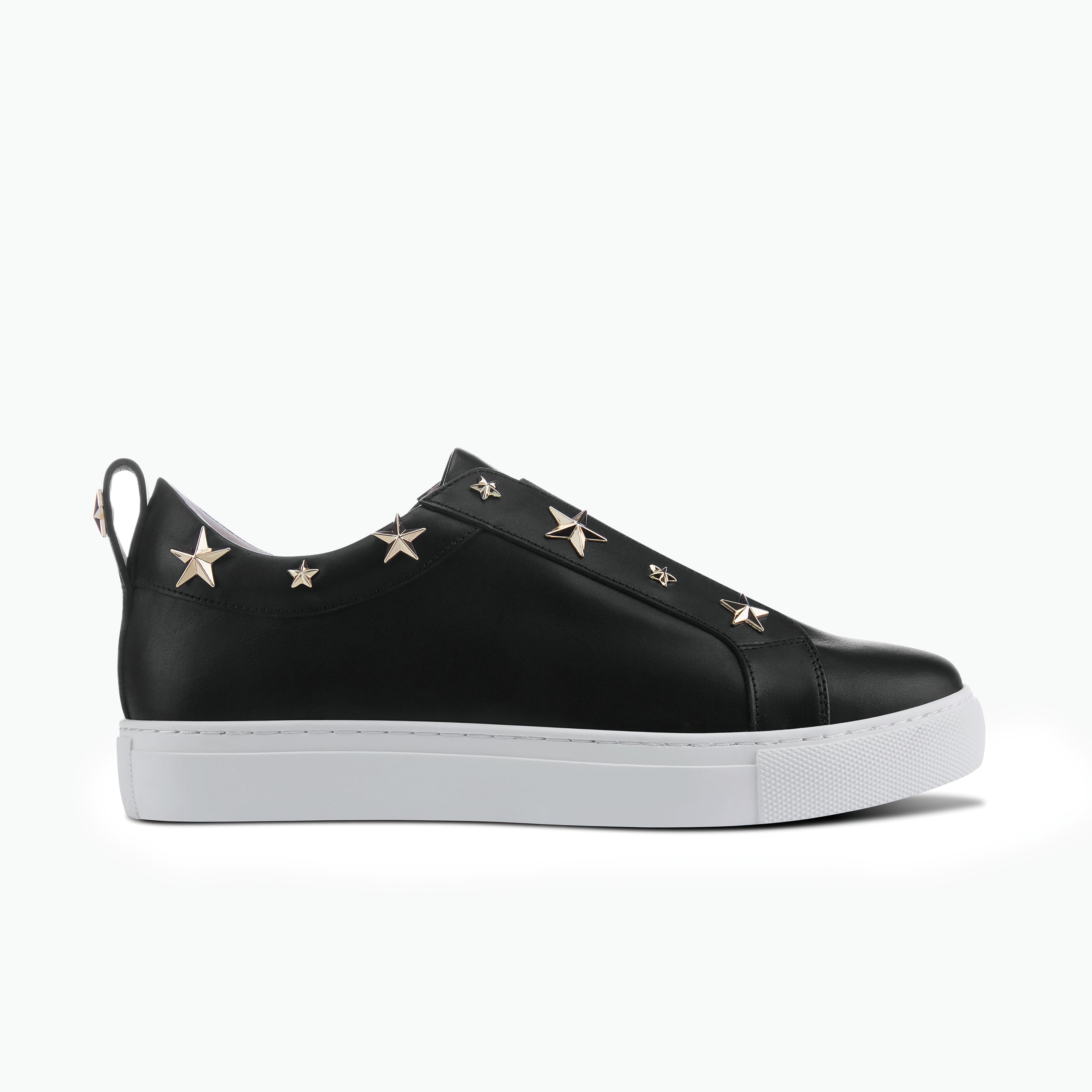 Felix black pull-on sneaker with white sole and gold stars around top line.