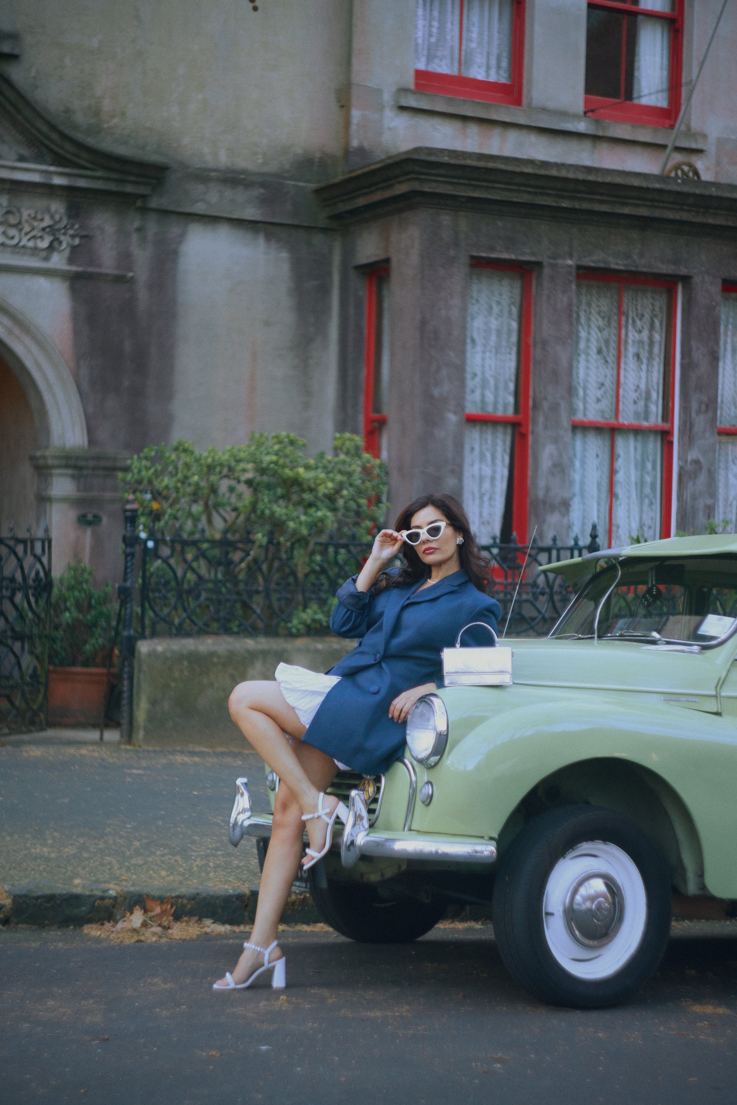 Campaign photo of woman wearing Flo sandal shown from the side.