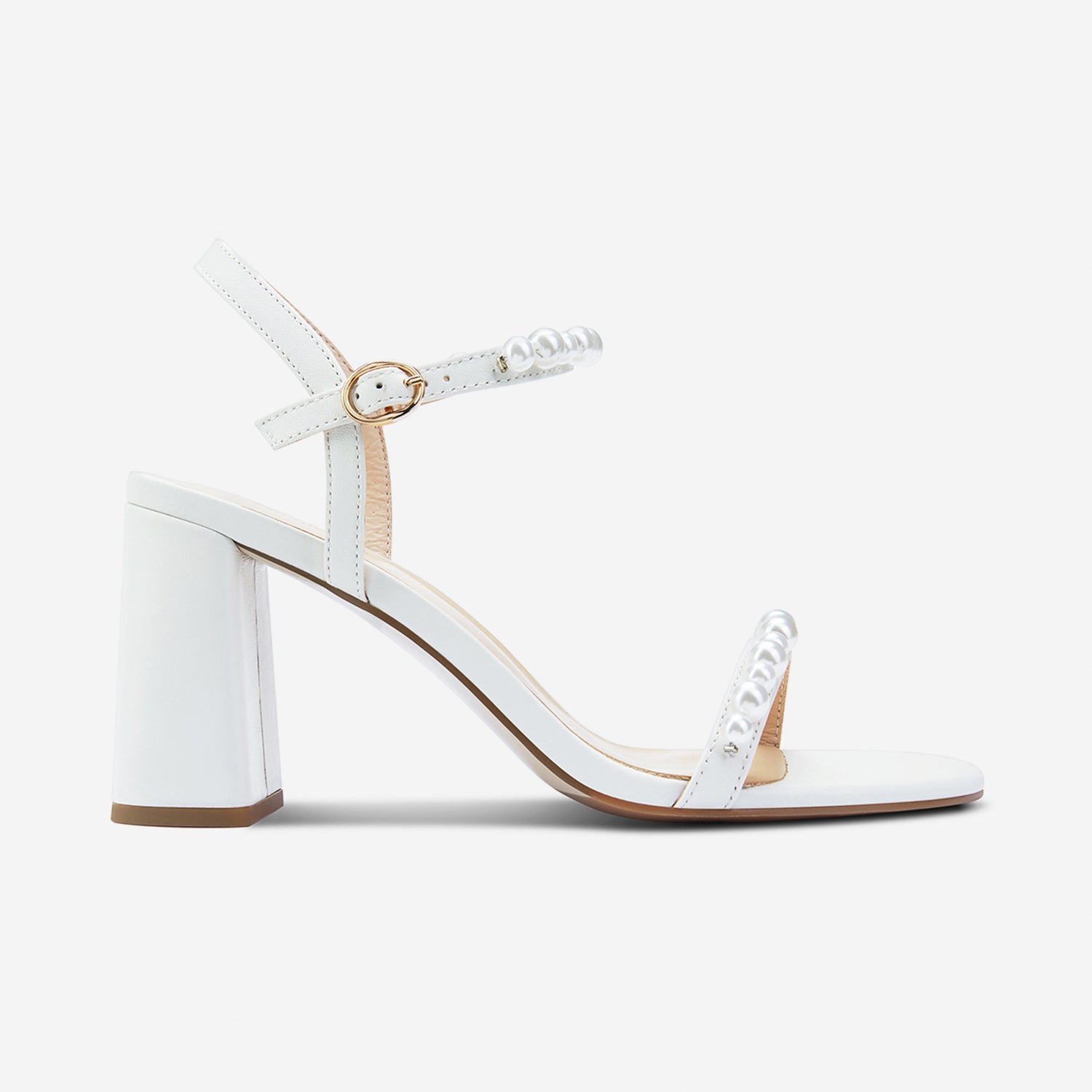 Side view of Flo off-white sandal with pearls. Heel height is 8cm.