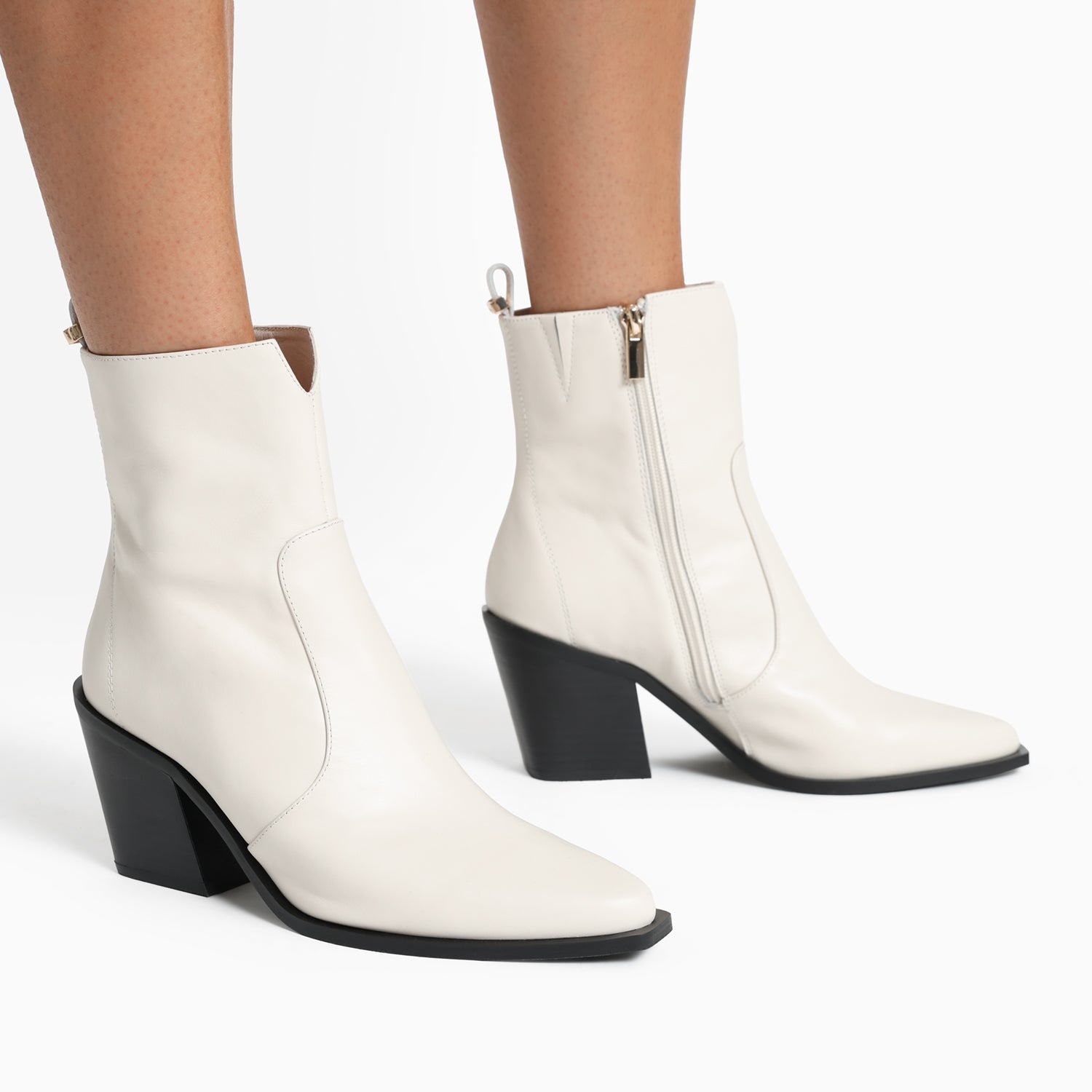 Franklin ivory boot on women's feet.