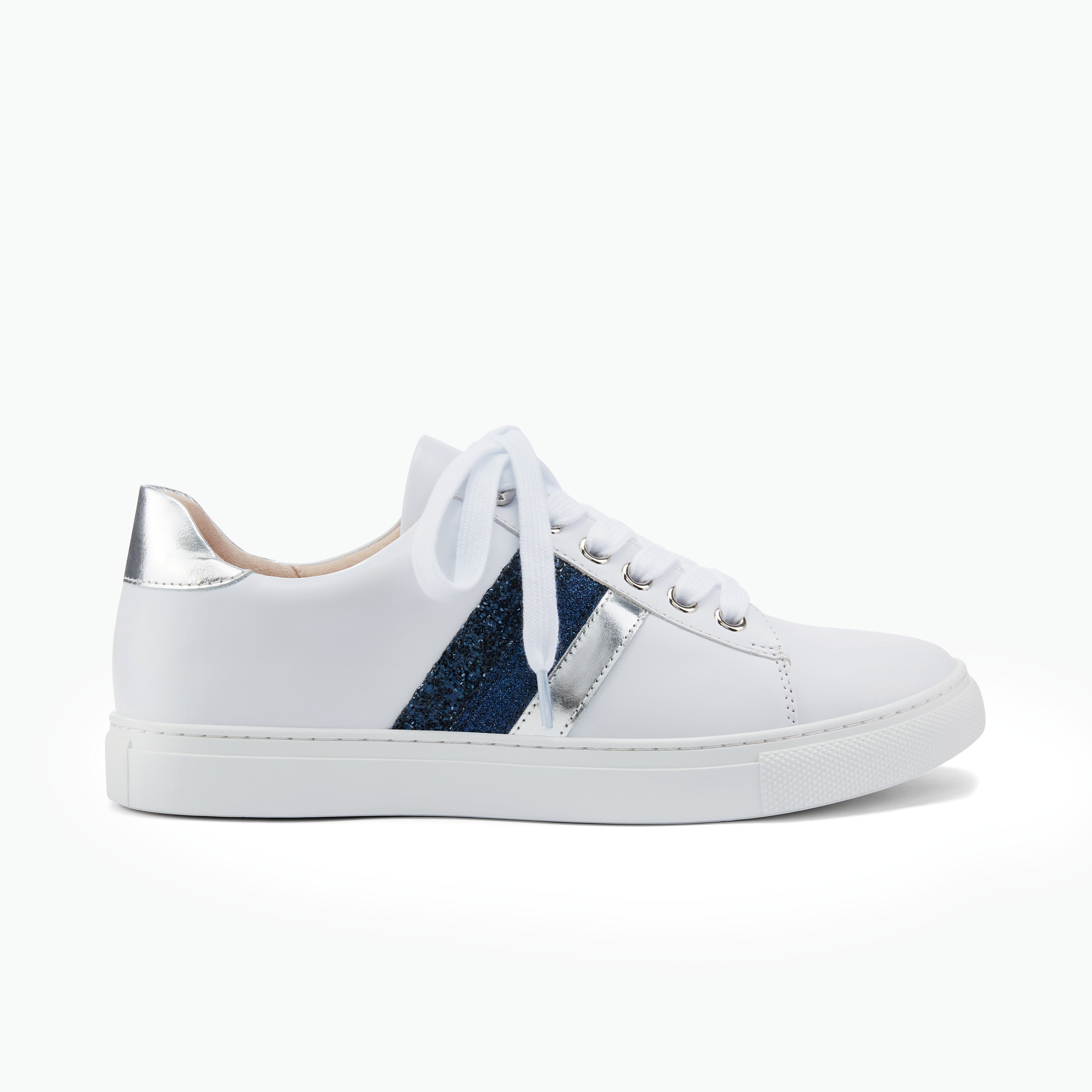 White sneaker with blue and silver stripe and silver heel on a white background