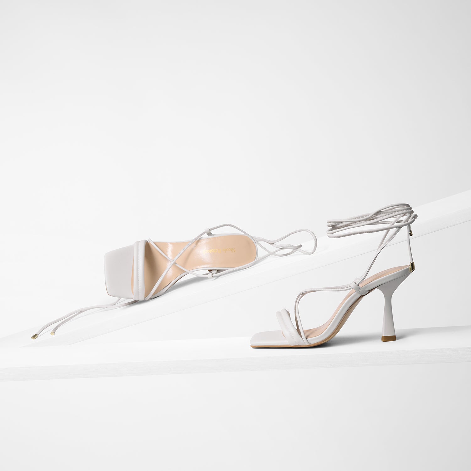 Gio white leather sandals with 85mm heel and square toe shown from all sides.
