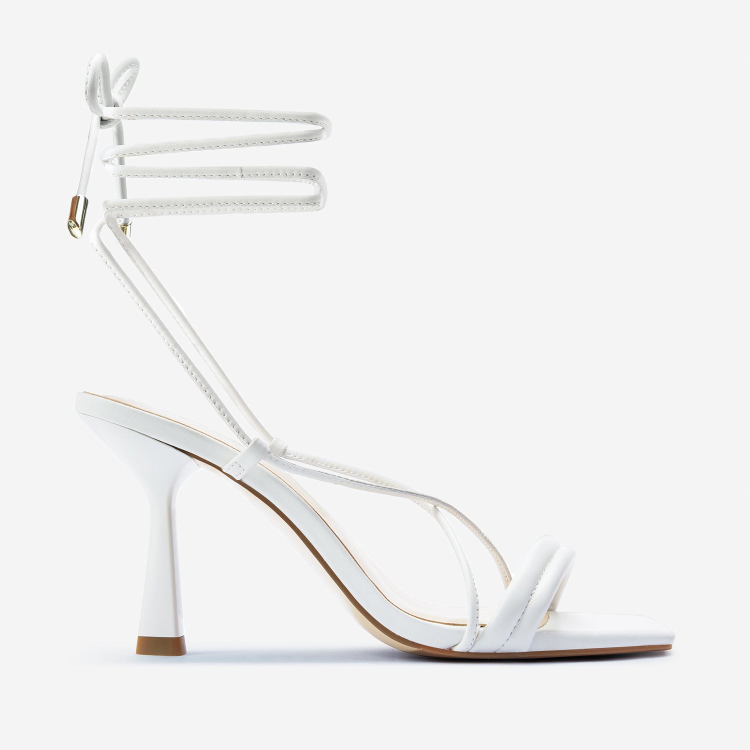 Gio white leather lace up sandal shown from the side.