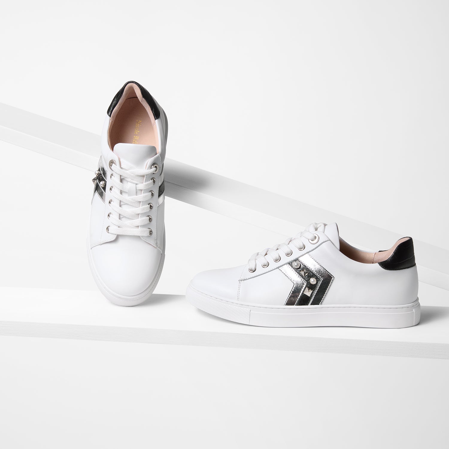 All angles of Gray white/silver/black leather.