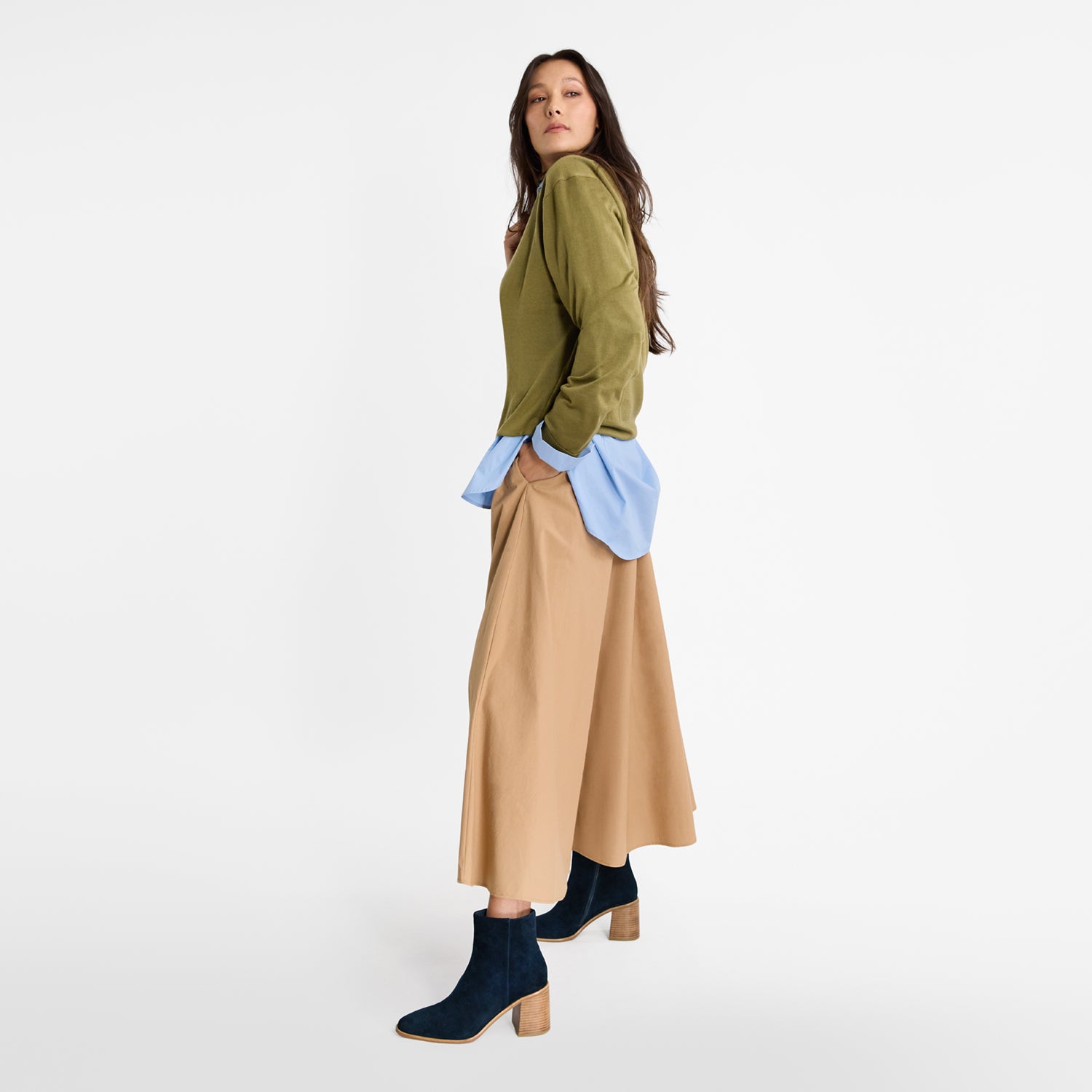 Woman wearing Nicole Rebstock's navy blue Hali Ankle Boot with block 8cm heel and almond toe.