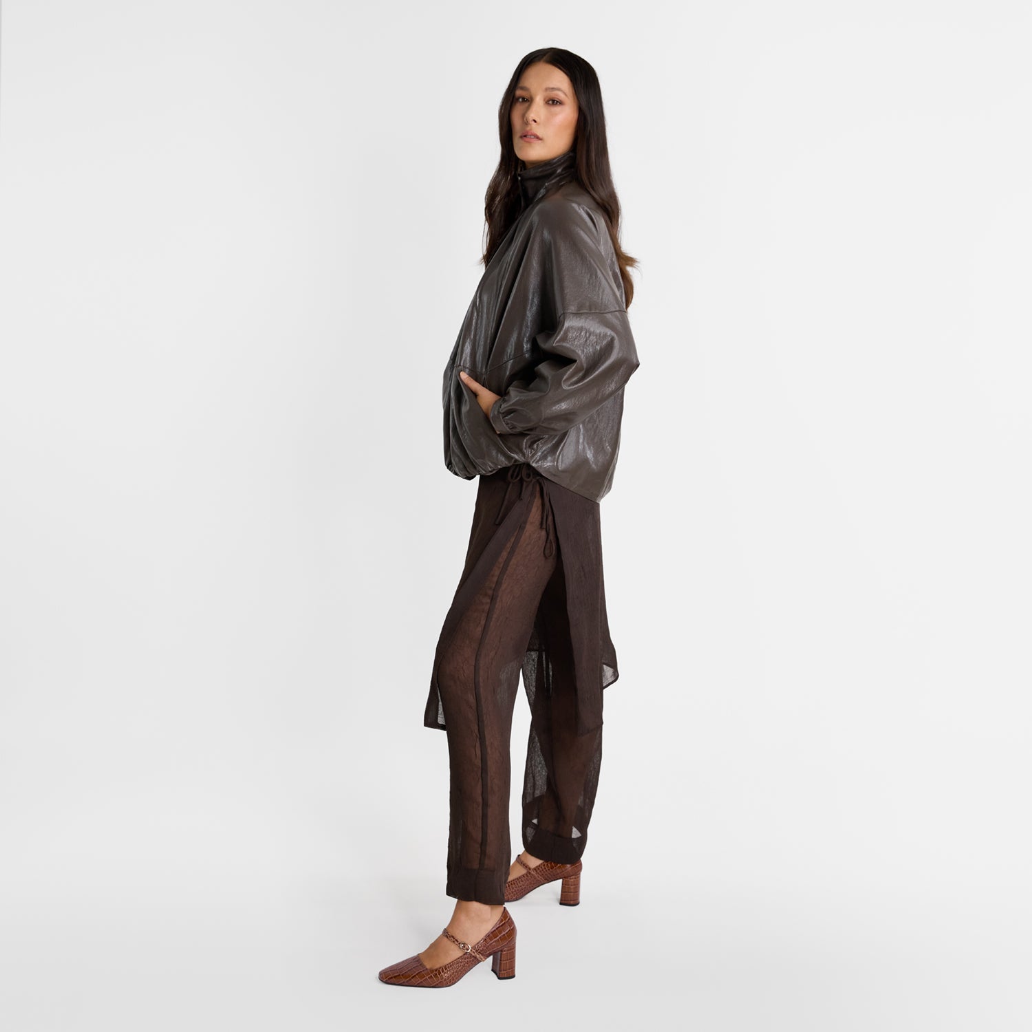 Model wearing Nicole Rebstock's Ivy pumps in croc print brown. Mary Jane style.