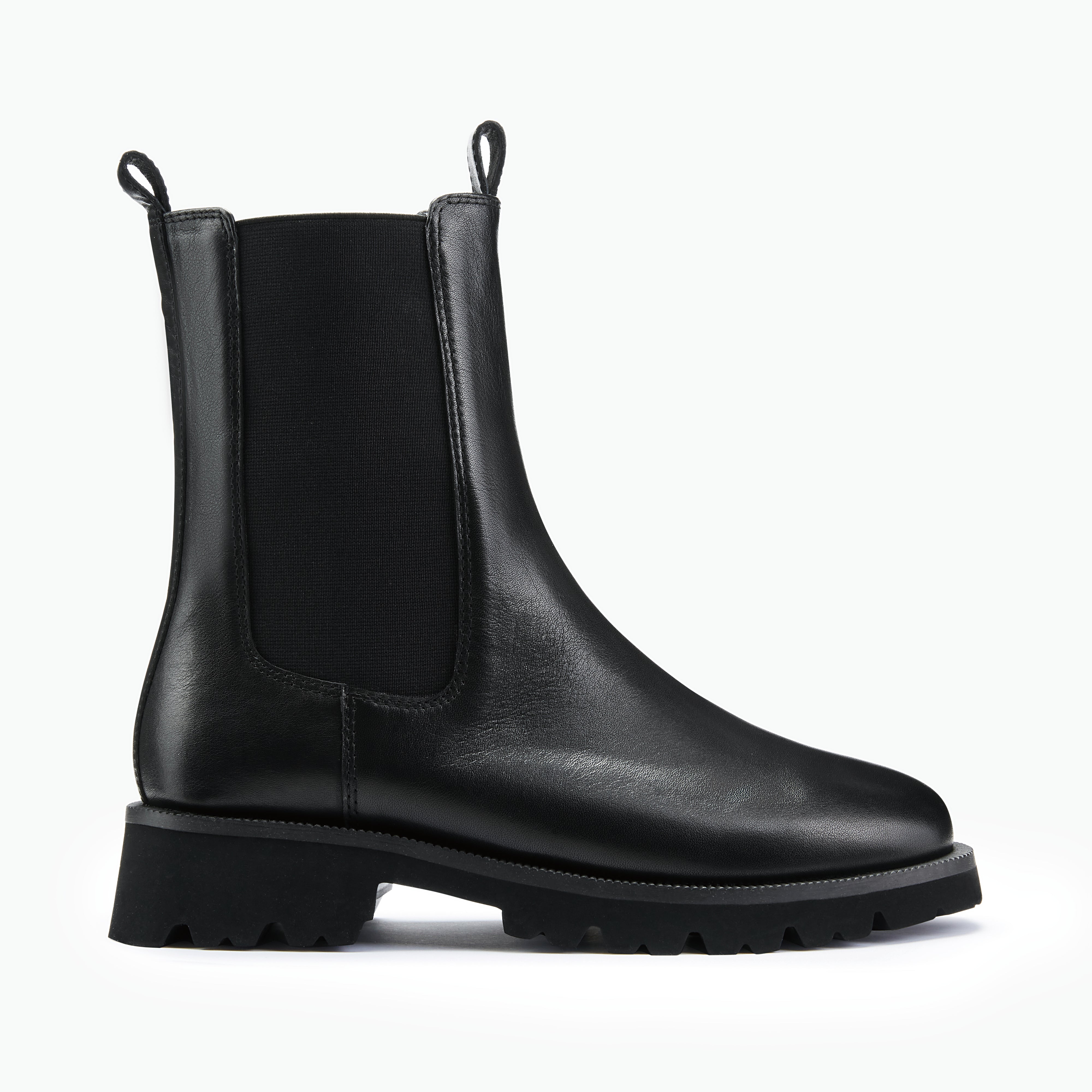 Flat black leather chelsea boot on white background
