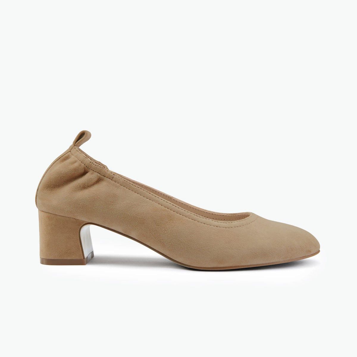 A coco taupe suede pump with a block heel and a small pull tab, shown in profile against a clean white background.
