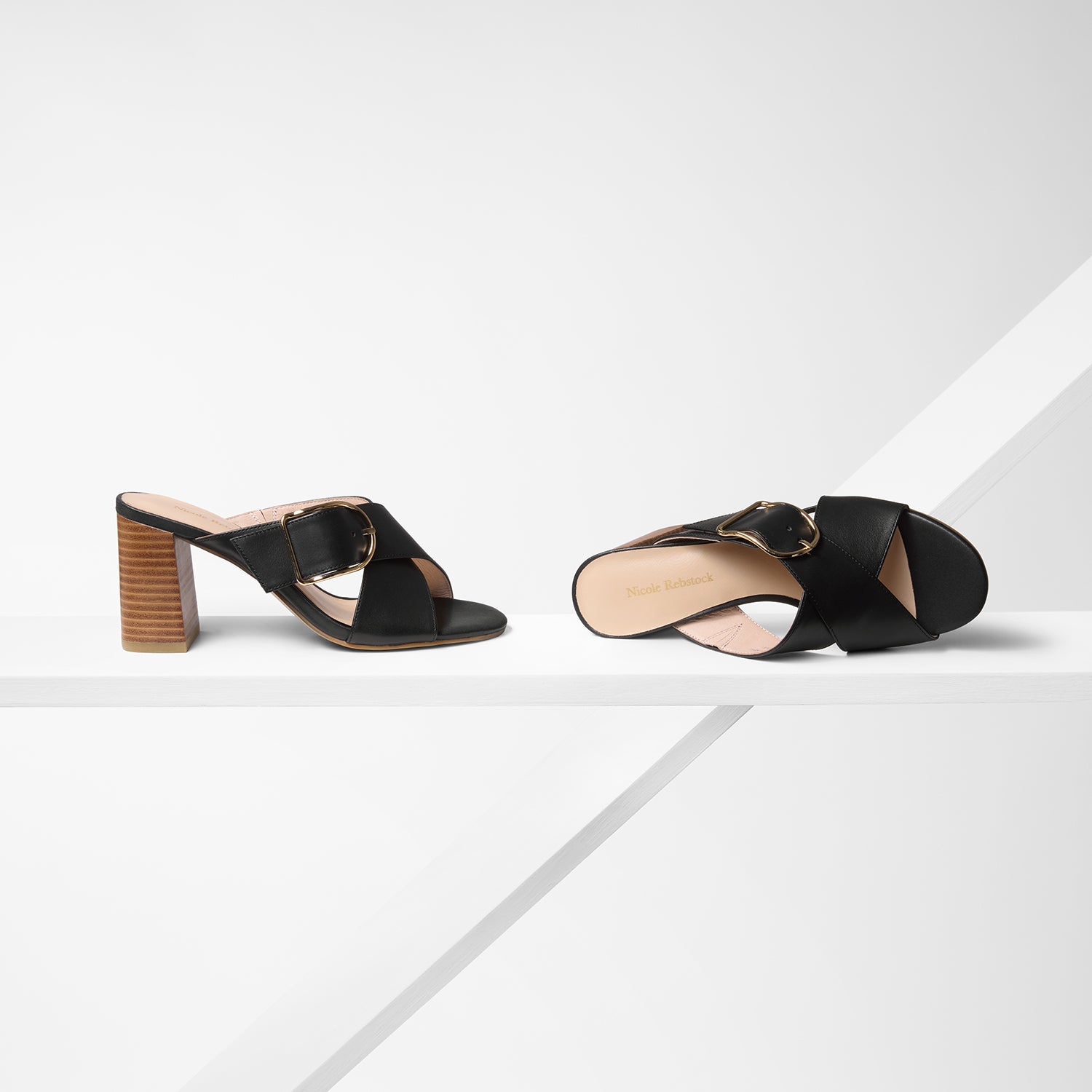Kylie black leather mule with stacked leather heel shown from all angles.
