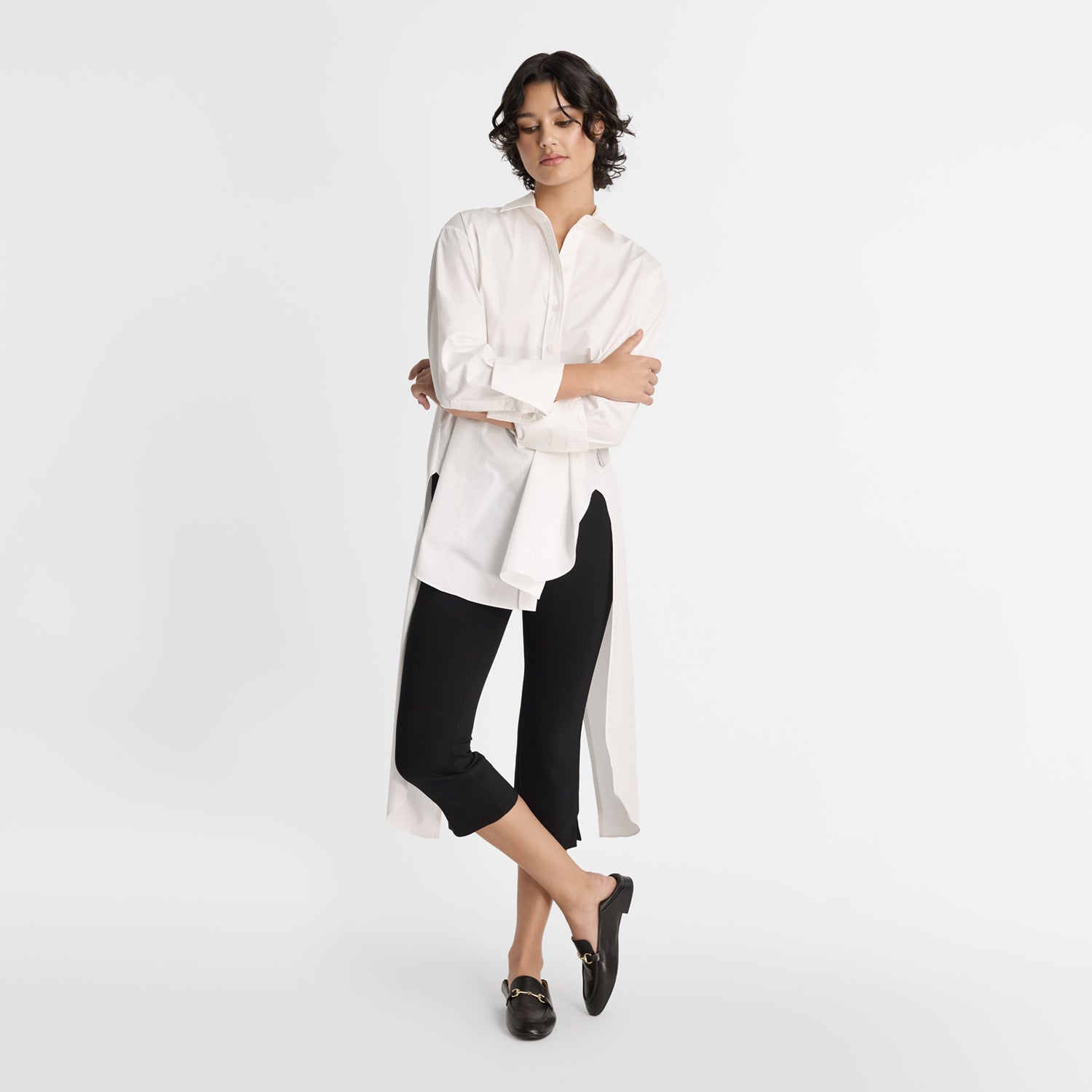 Model wearing Nicole Rebstock Lenny Mule Loafer in black leather.
