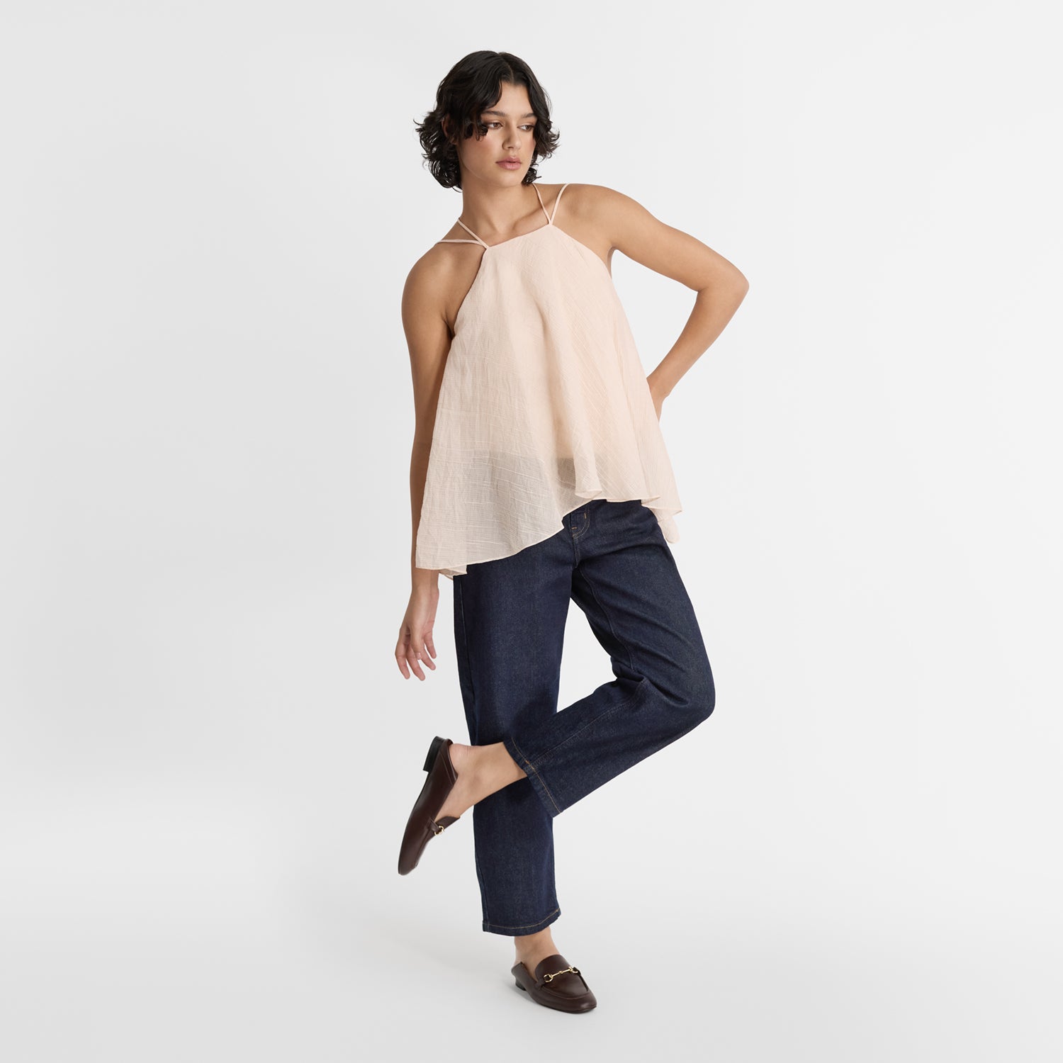 Model wearing Nicole Rebstock's Lenny Loafers in espresso brown leather.