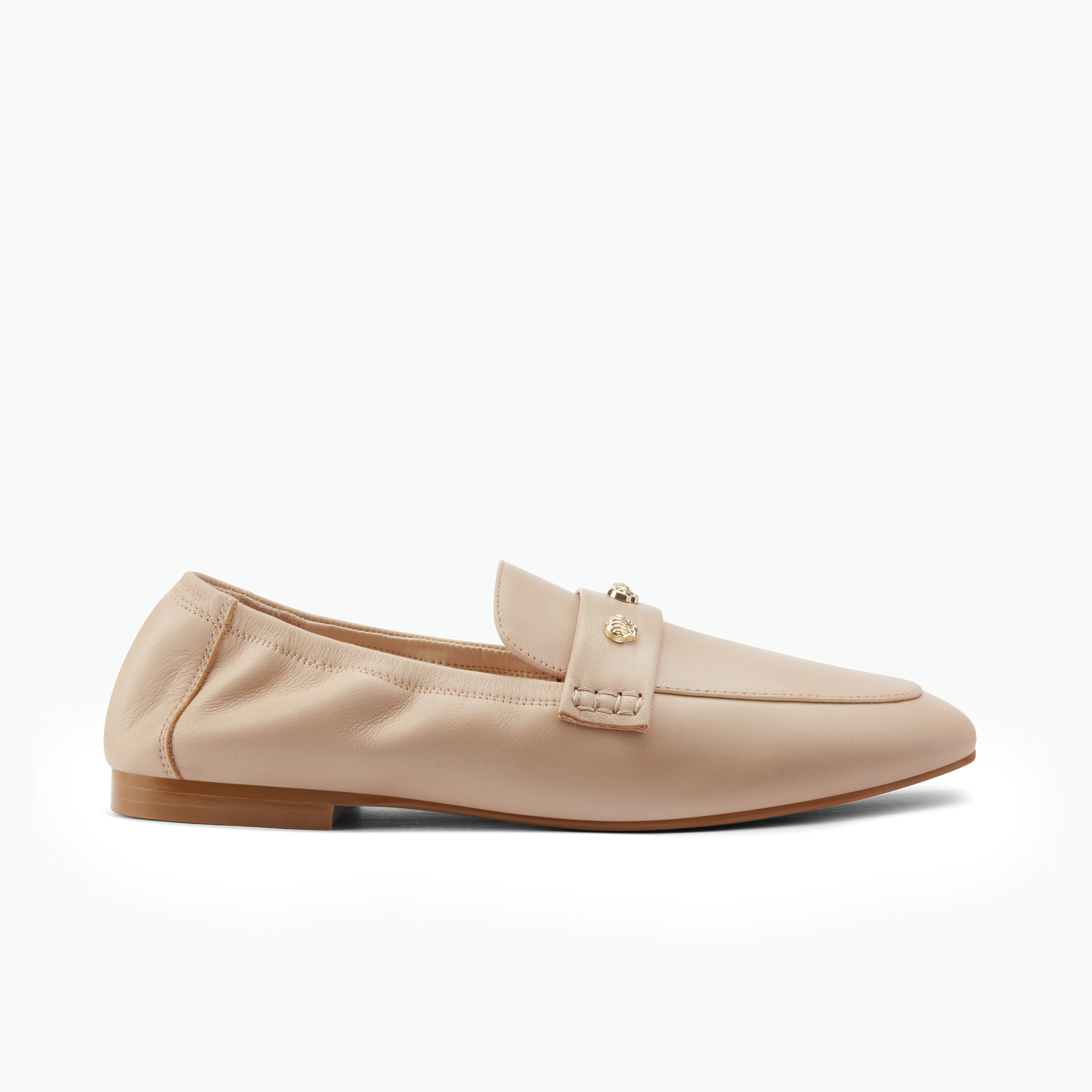 Flat nude leather loafer called Libby Loafer on a white background by Nicole Rebstock