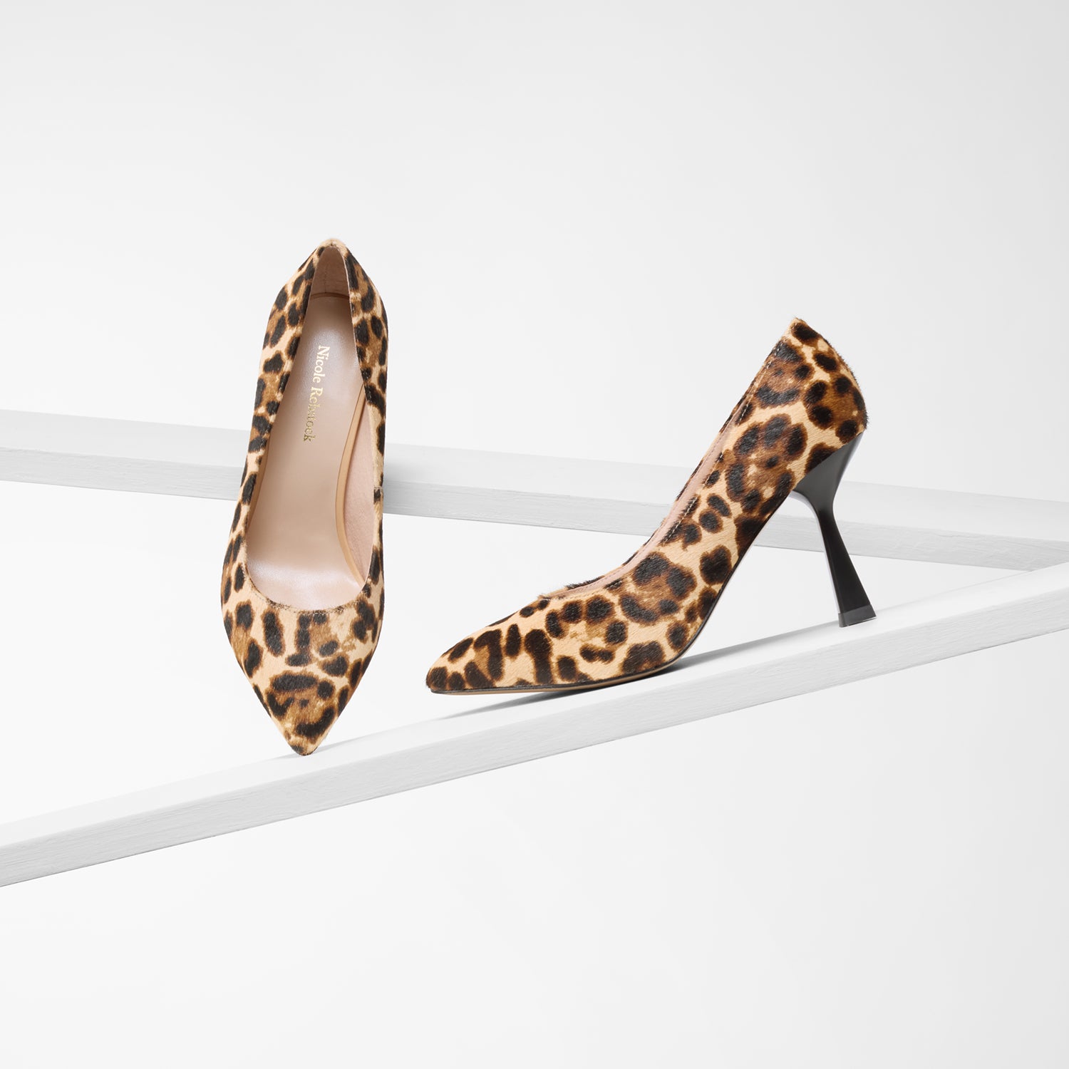Limited edition Lisbon cheetah print pumps with stilettos heel. 8.5cm heel. Shown from various angles.