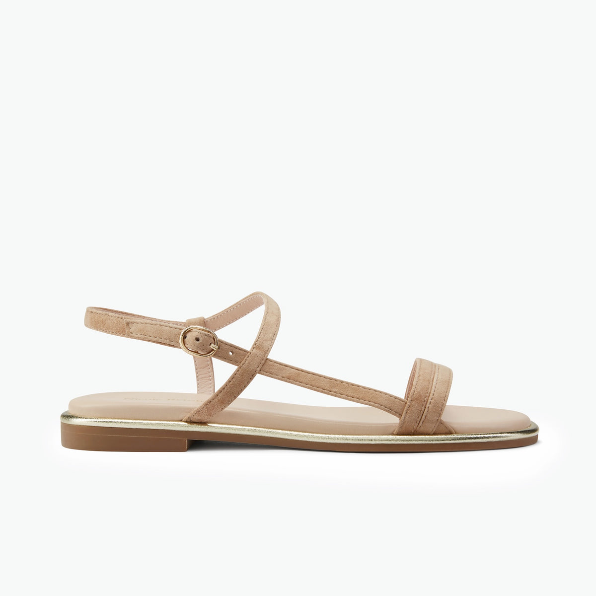 Flat Strappy nude suede sandal on white background.