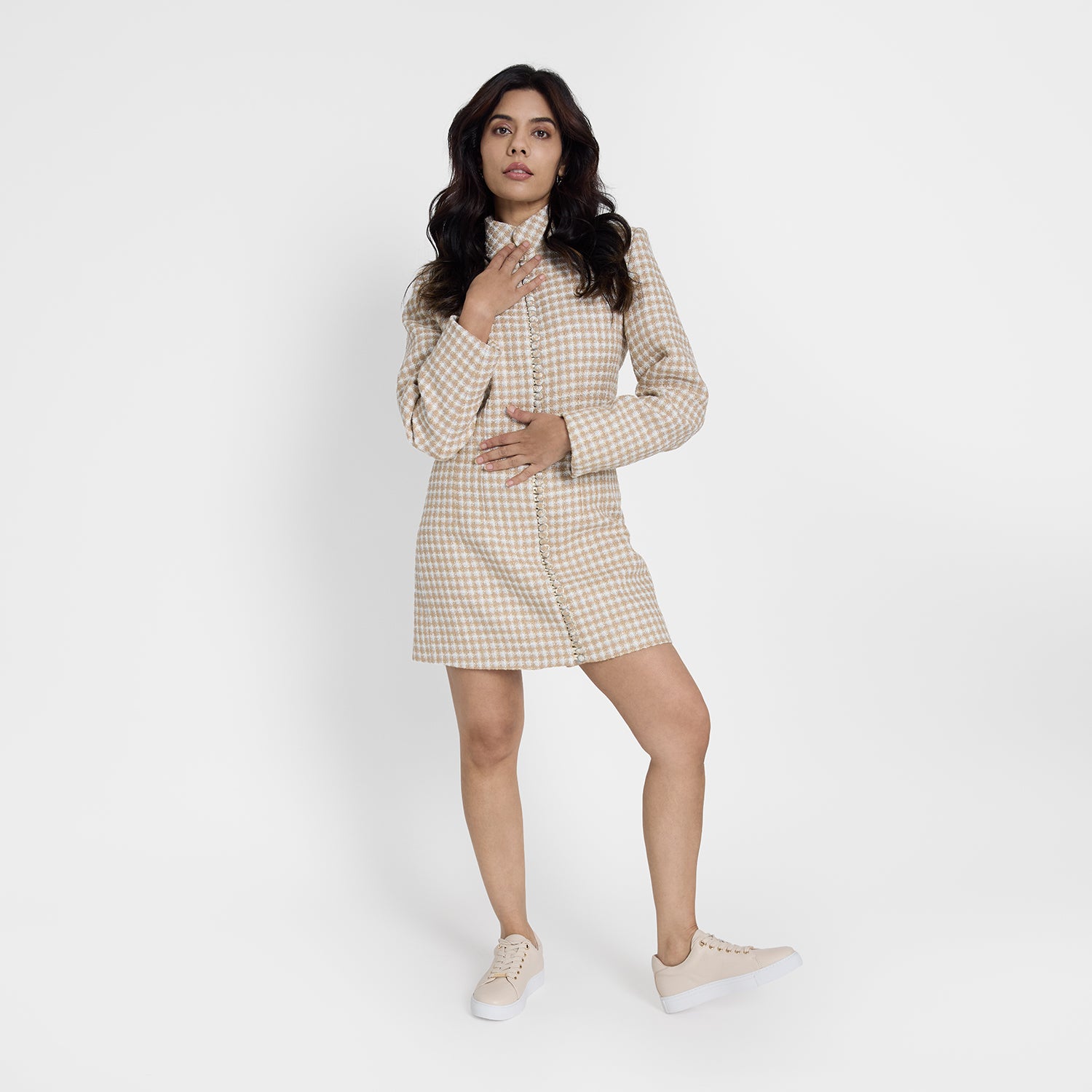 Model wearing mace blush pebble sneaker. The sneaker has leather lining.