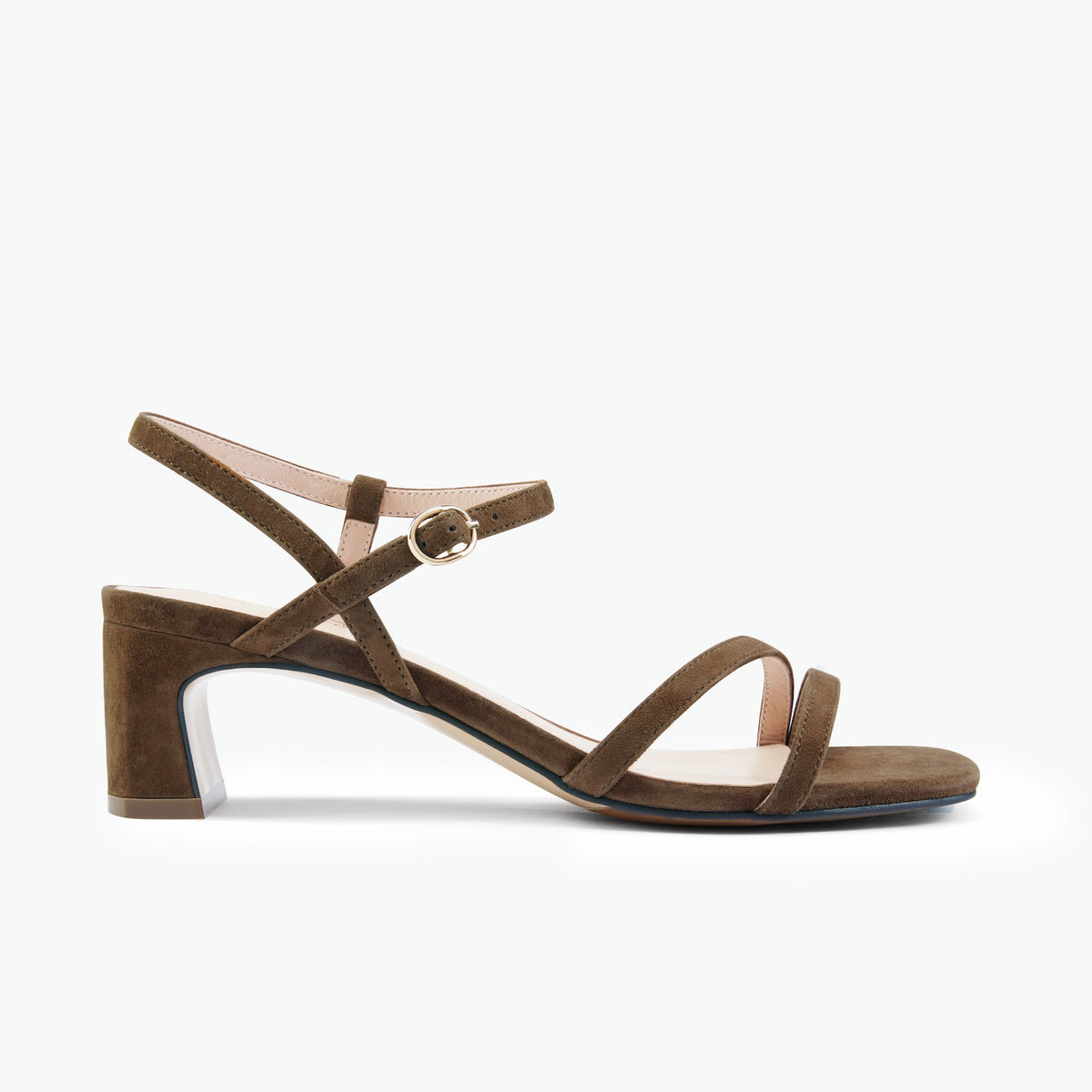 A single brown suede block-heel sandal with a low block heel, square toe, and an ankle strap with a small gold buckle, shown from a side profile on a light gray background.