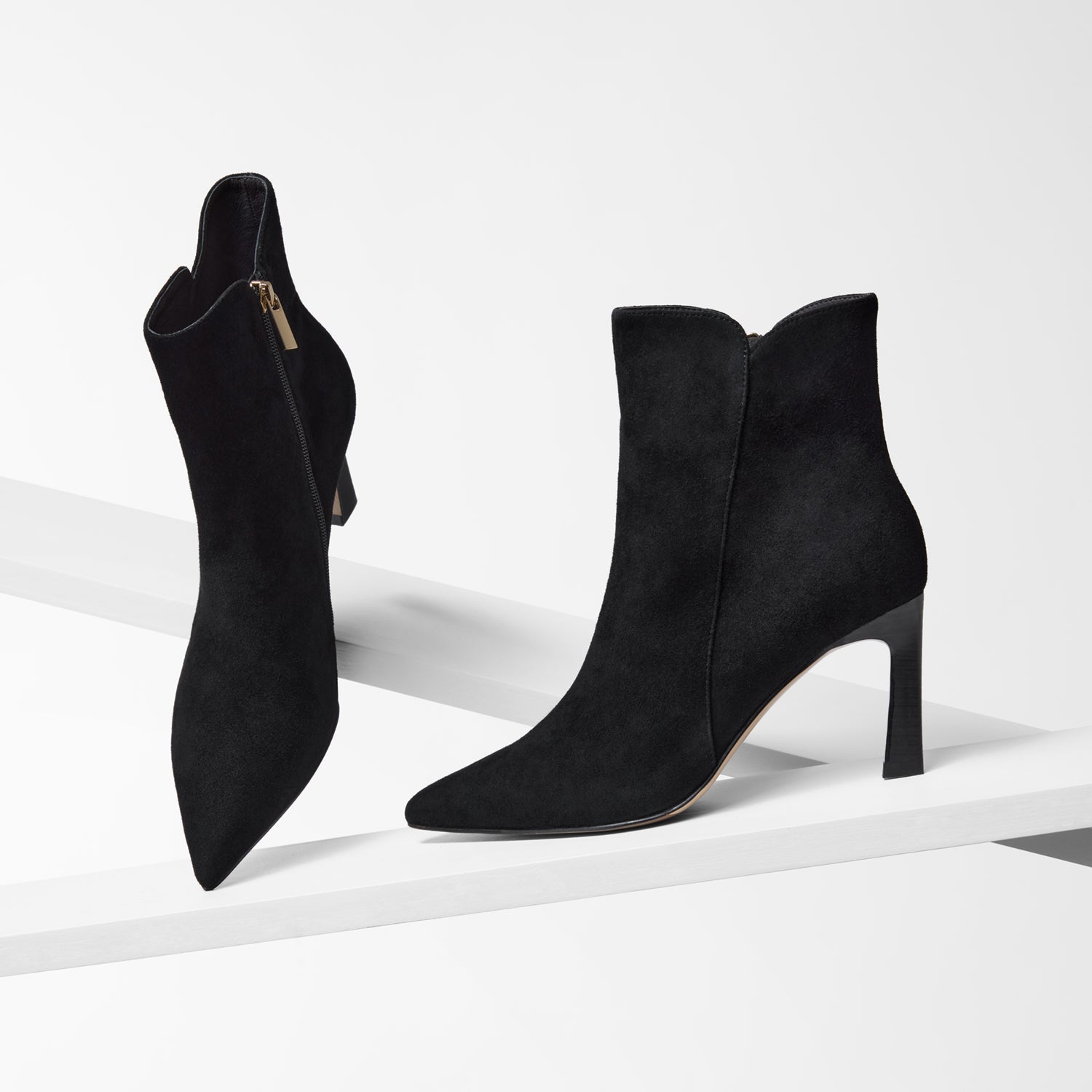 Nicole Rebstock black suede leather ankle boots shown from various angles. 8cm heel and pointed toe.