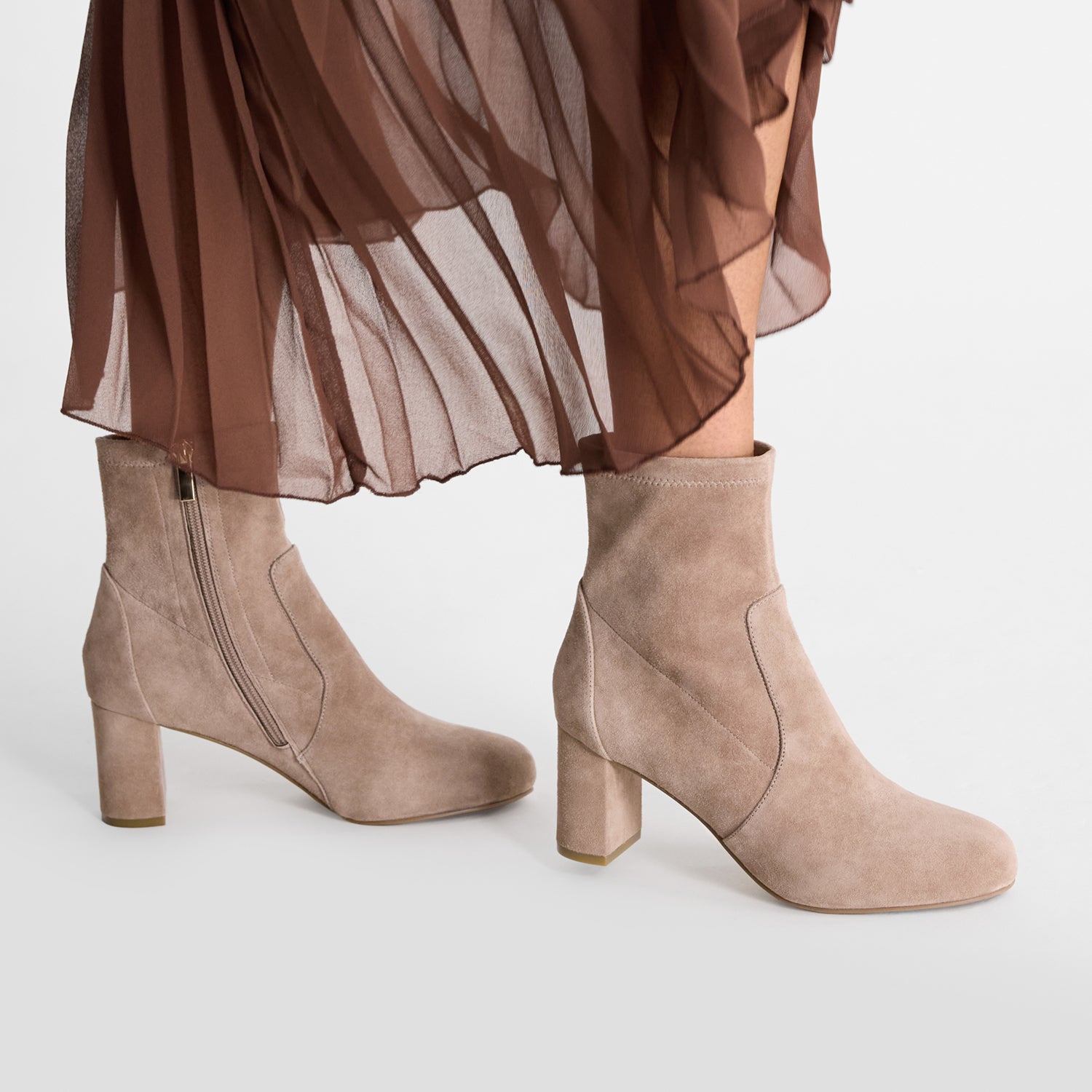 Latte suede ankle boots with 6.5cm heel.