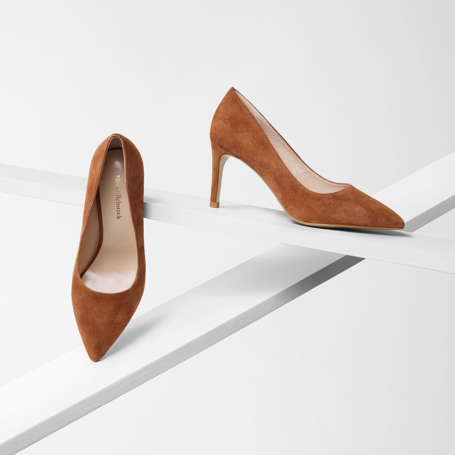 Nemesis 78mm rust suede pointed toe pump shown on planks from all angles