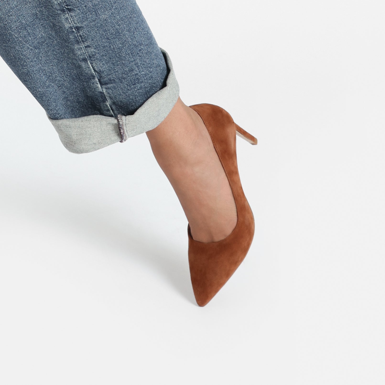 Close up of Nemesis rust suede on women's feet