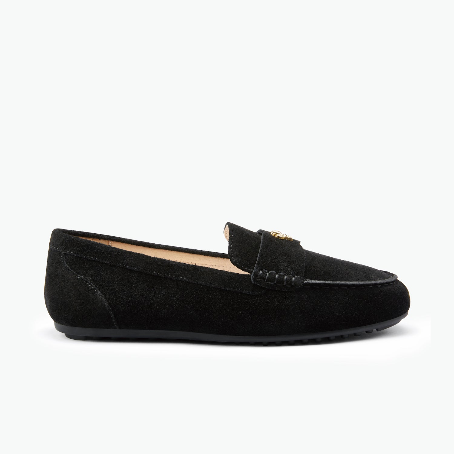 Black suede loafer on a white background