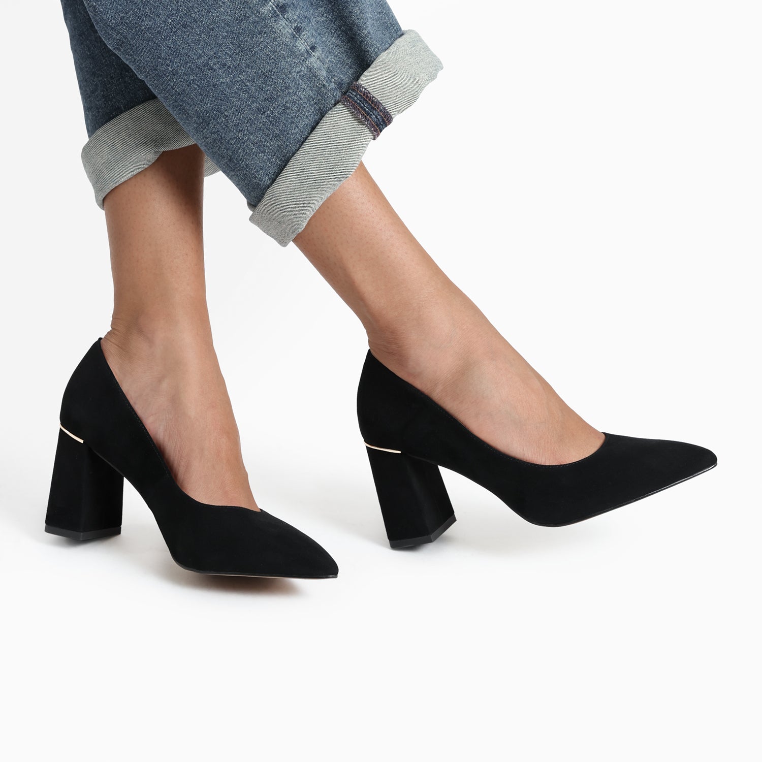 Nova black suede pointed toe pump on model close up