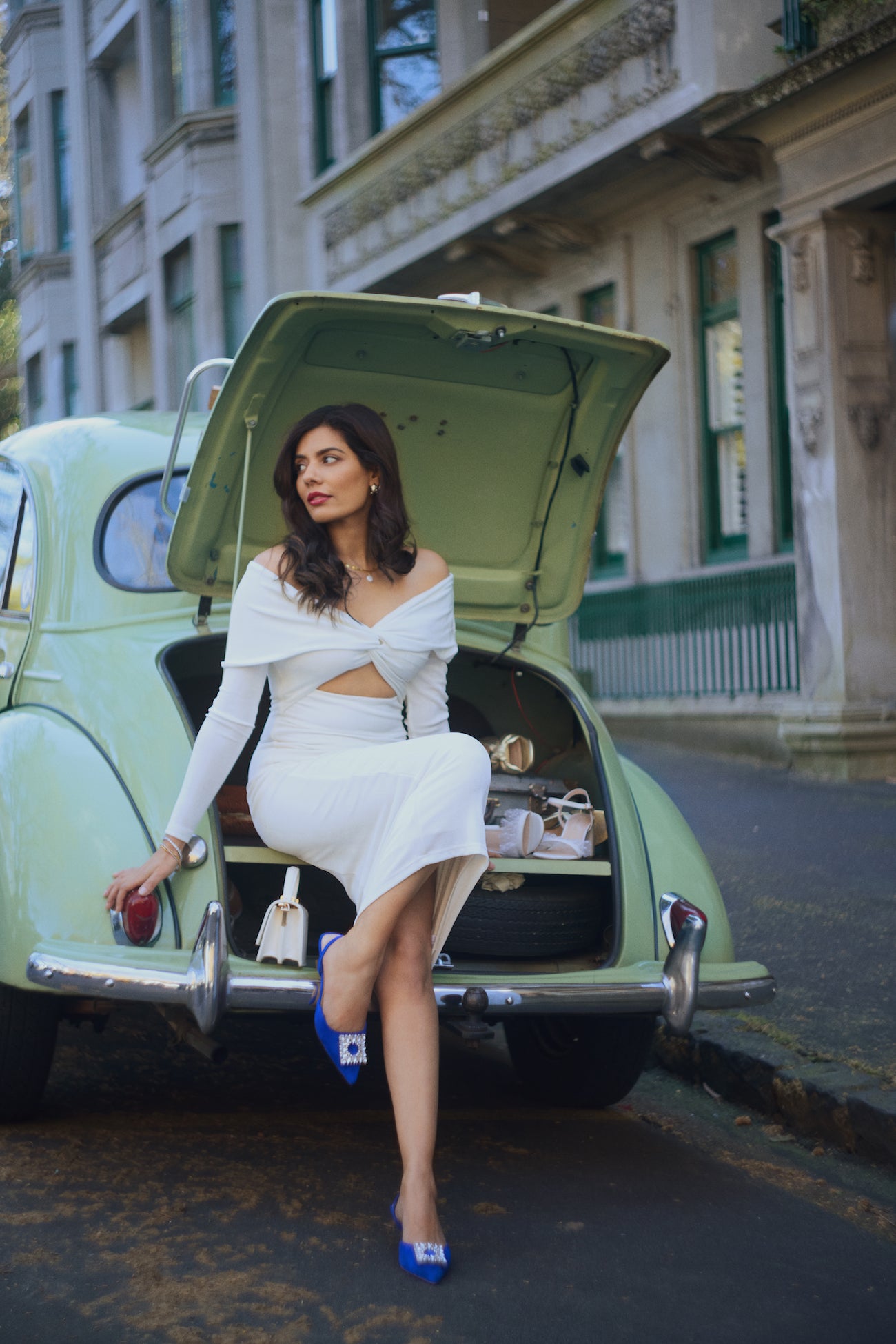 Closer look at campaign imagery of Sasha cobalt blue suede slingback heel.