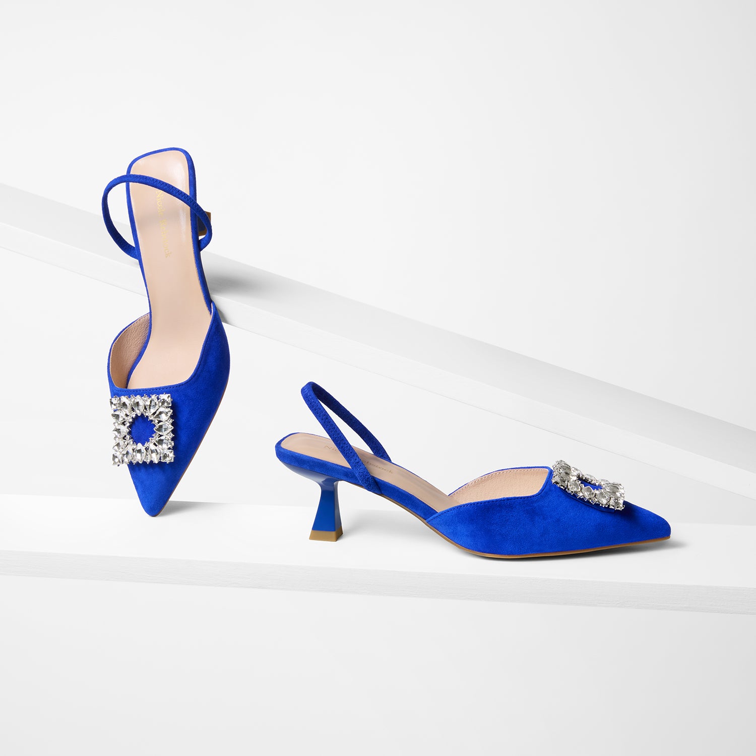Sasha slingback in cobalt blue suede leather from all sides. The powder coated heel is 5.5cm tall.