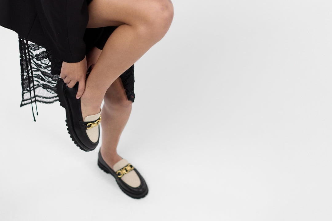 Model wearing black/linen flats by Nicole Rebstock