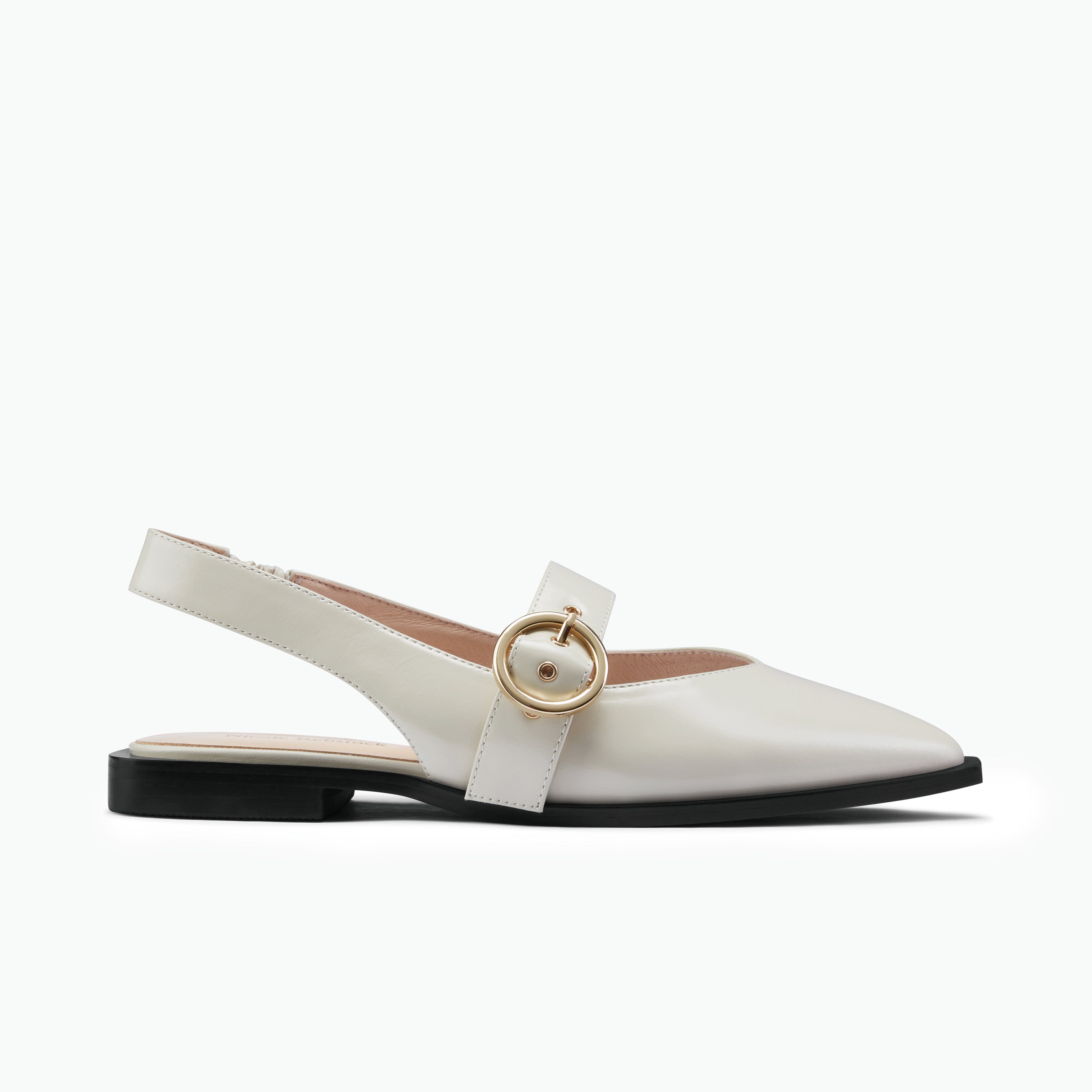 side profile of Valencia ivory oiled leather slingback with black sole and gold buckle