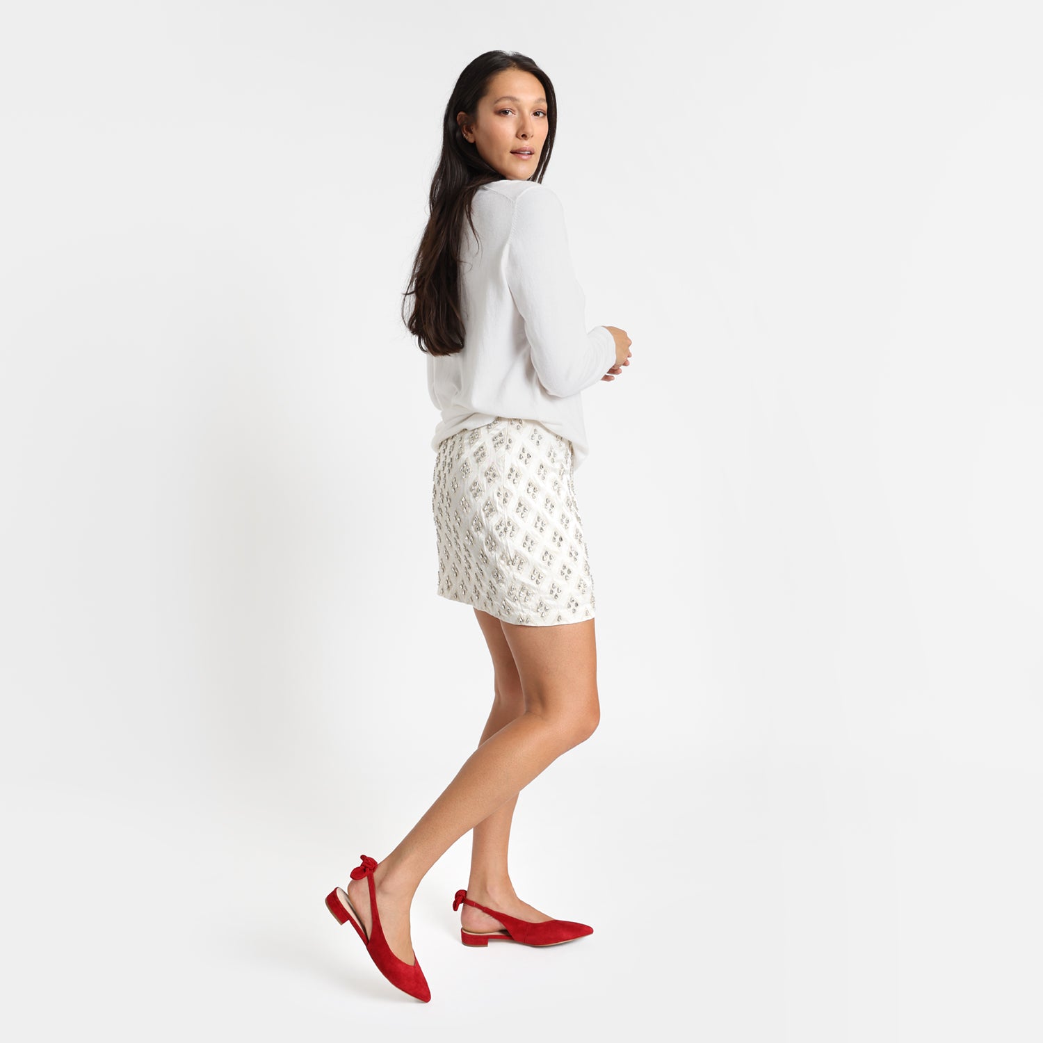 Model wears Vienna red suede slingback.