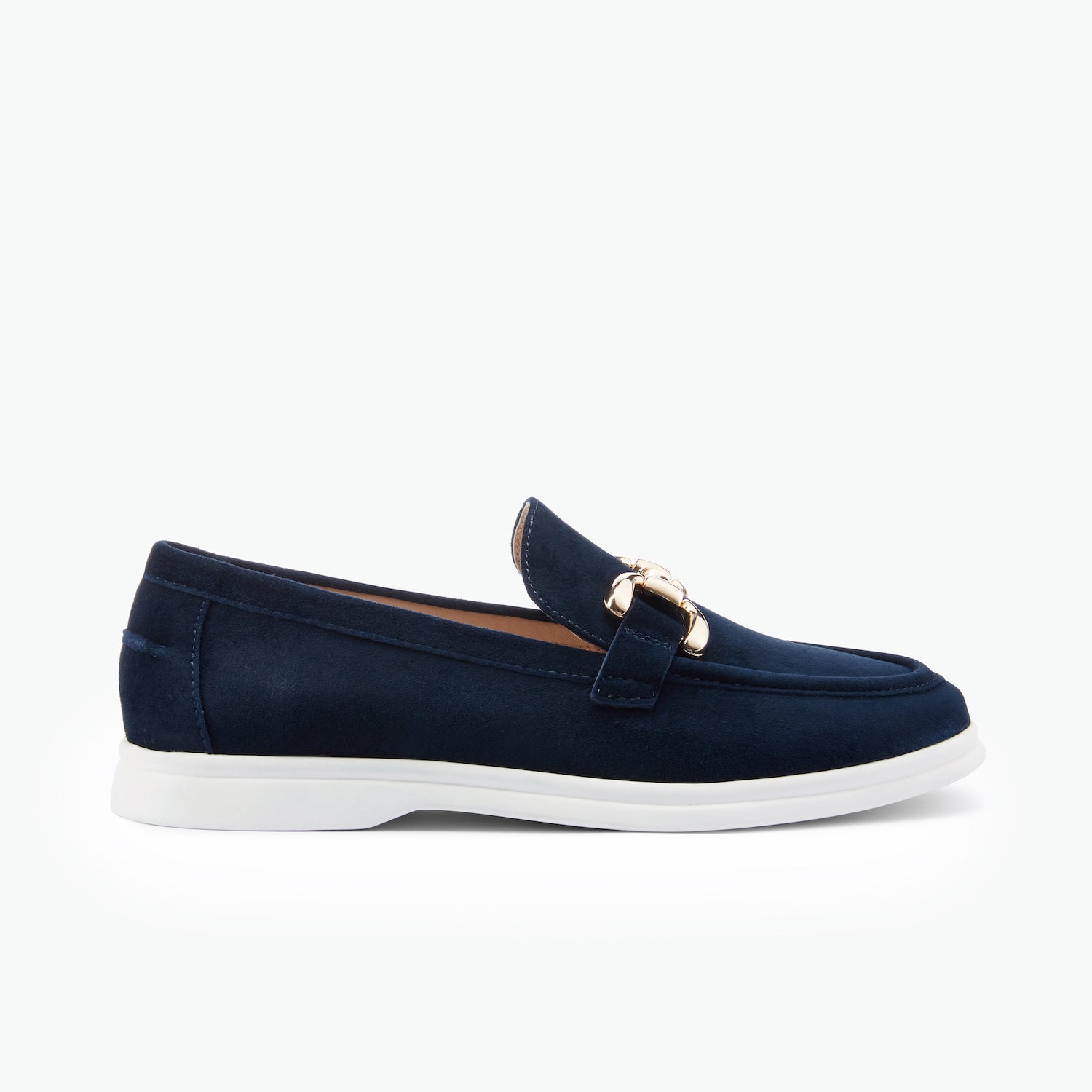Navy loafer with a gold buckle on a white background