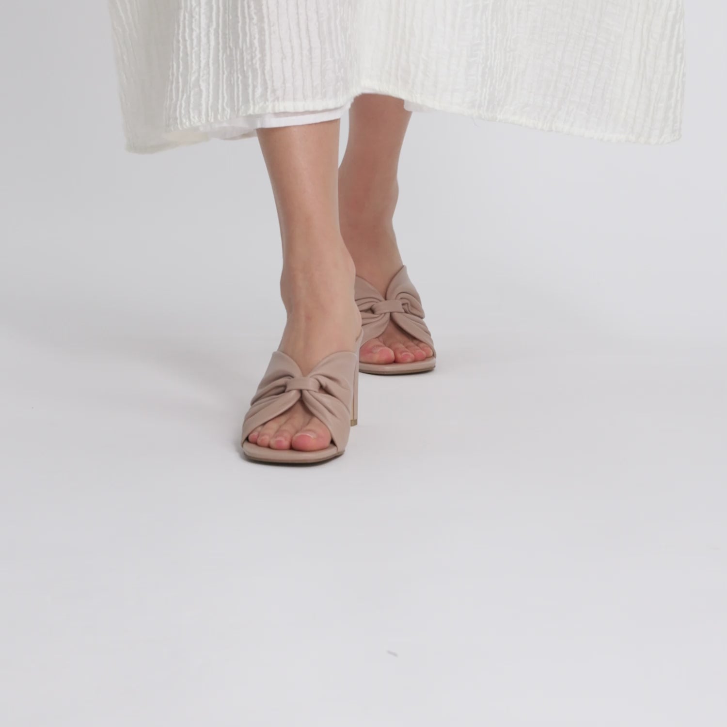Video of Valerie mule sandal heels by Nicole Rebstock in nude leather with 7.5 heel.
