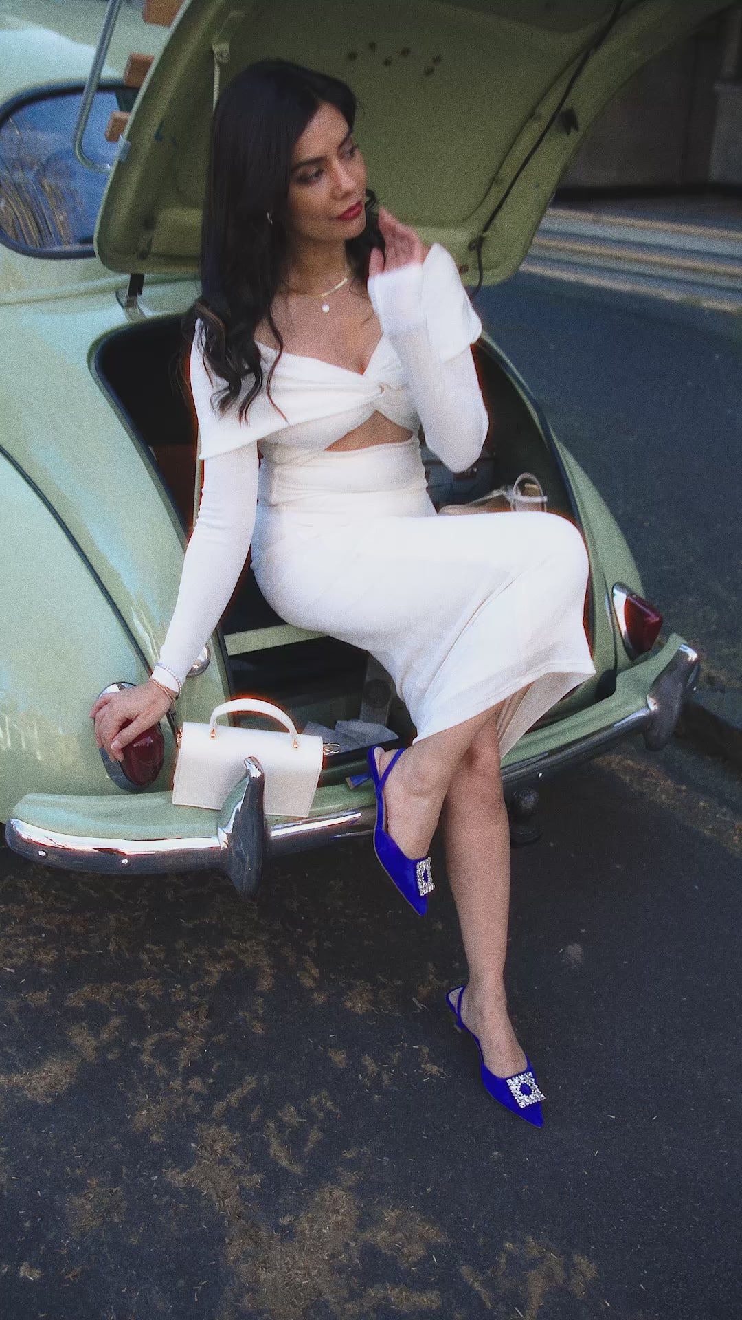 Campaign montage of woman in Auckland city wearing Sasha slingback heel in cobalt blue suede.