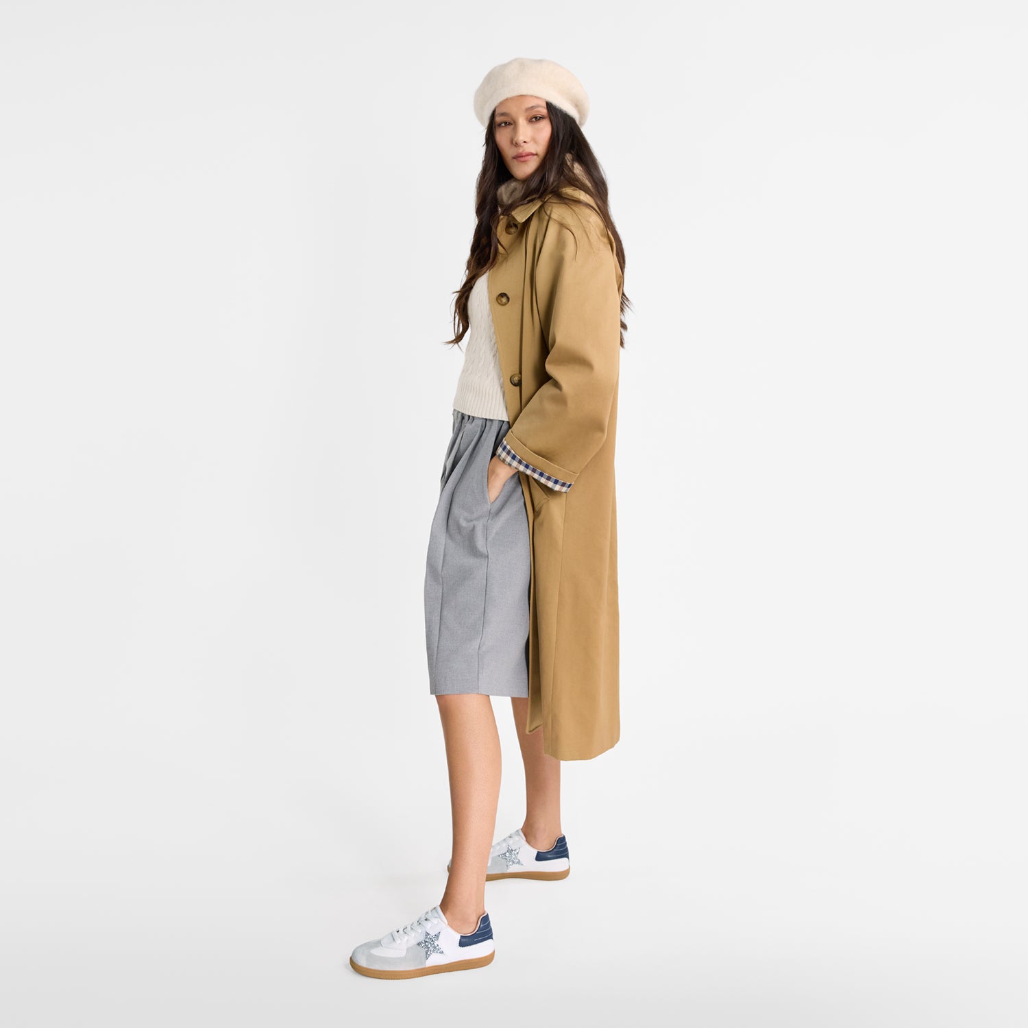 Model wearing Nicole Rebstock's white Amelia Sneaker.