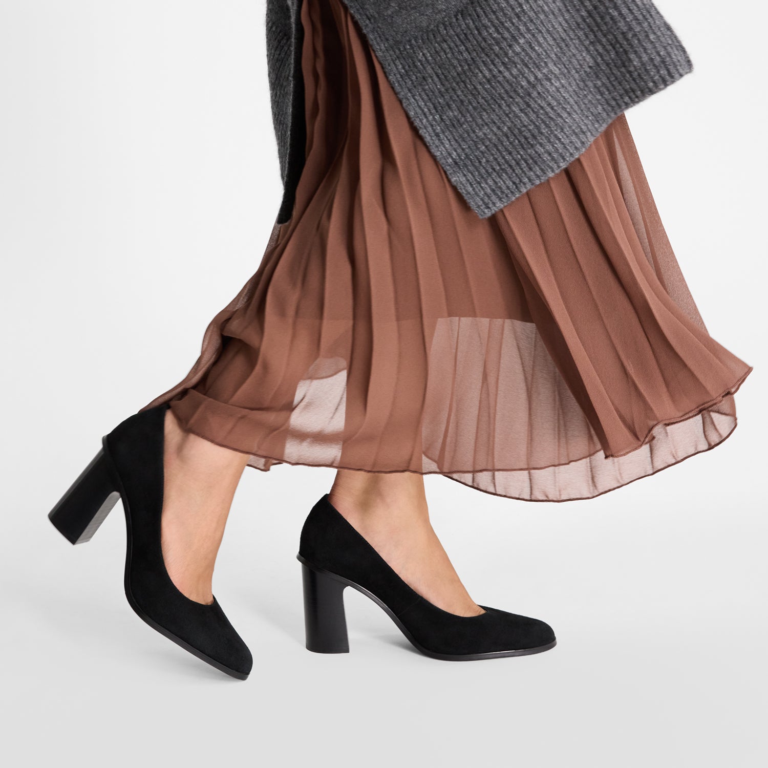 Model wearing Nicole Rebstock's Cassie Heels in black suede with 8.5cm heel and almond toe