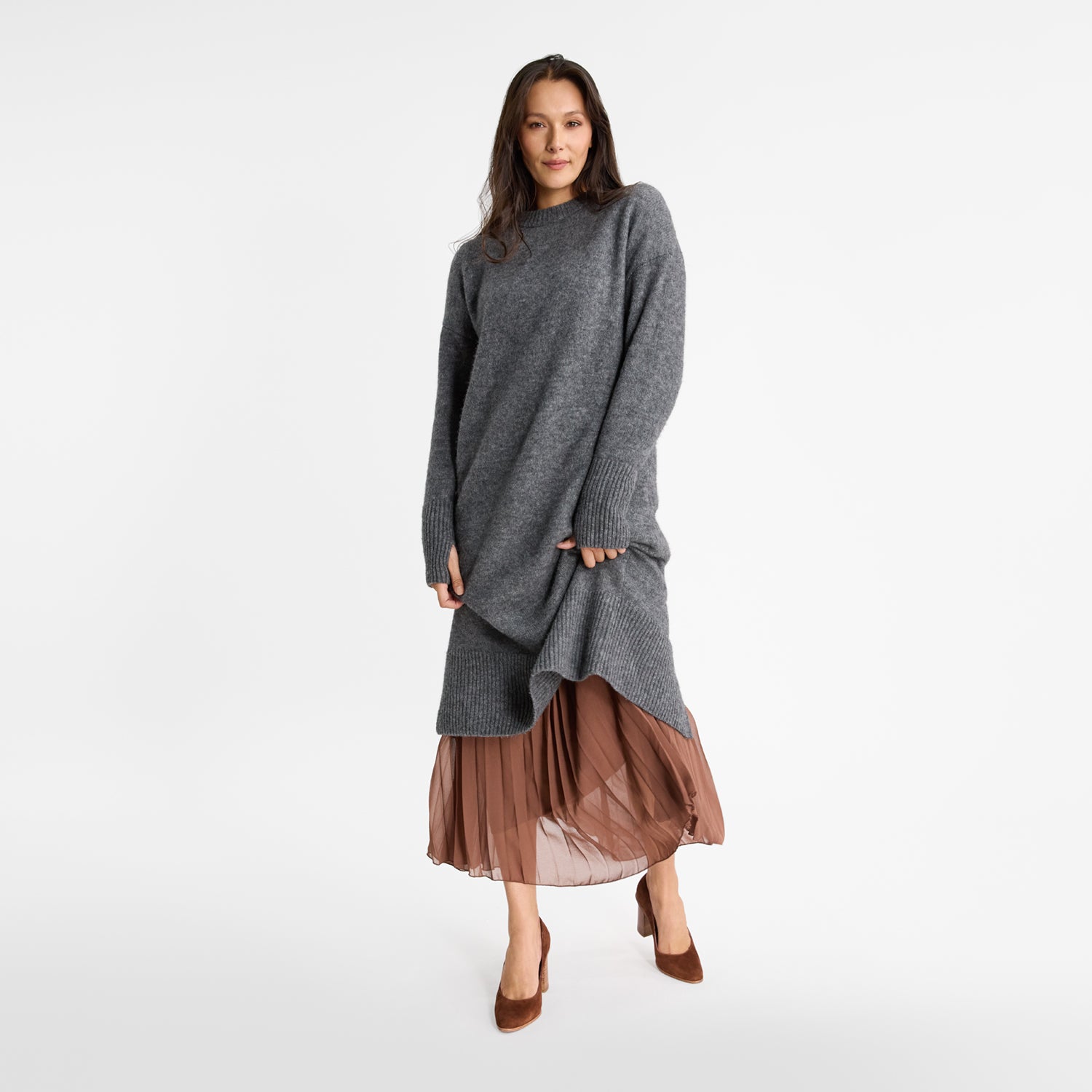 Model wearing Cassie pumps by Nicole Rebstock in brown suede