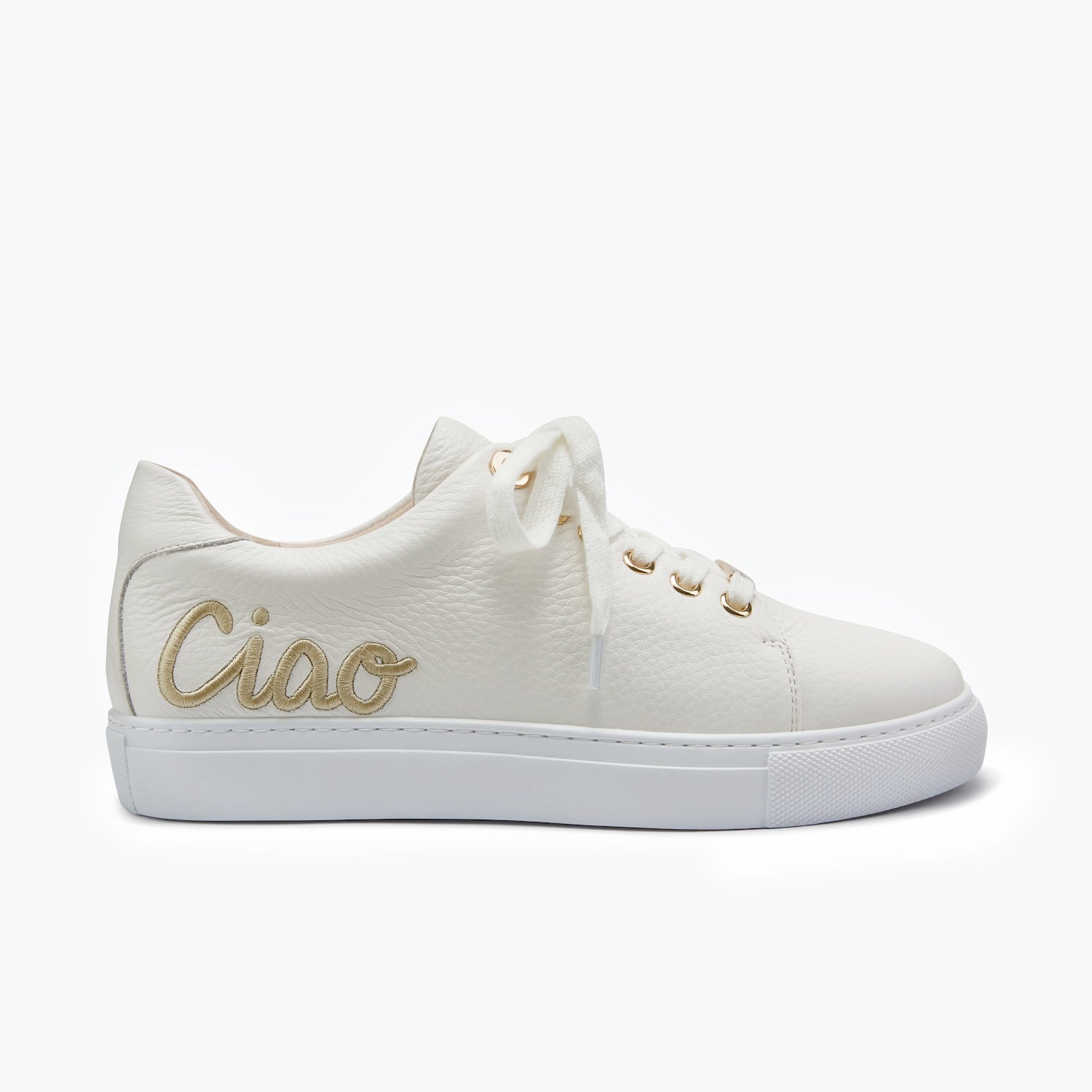 A white low-top leather sneaker with gold metallic 'Ciao' script embroidery on the side, white laces, and a white rubber sole, shown against a plain white background.
